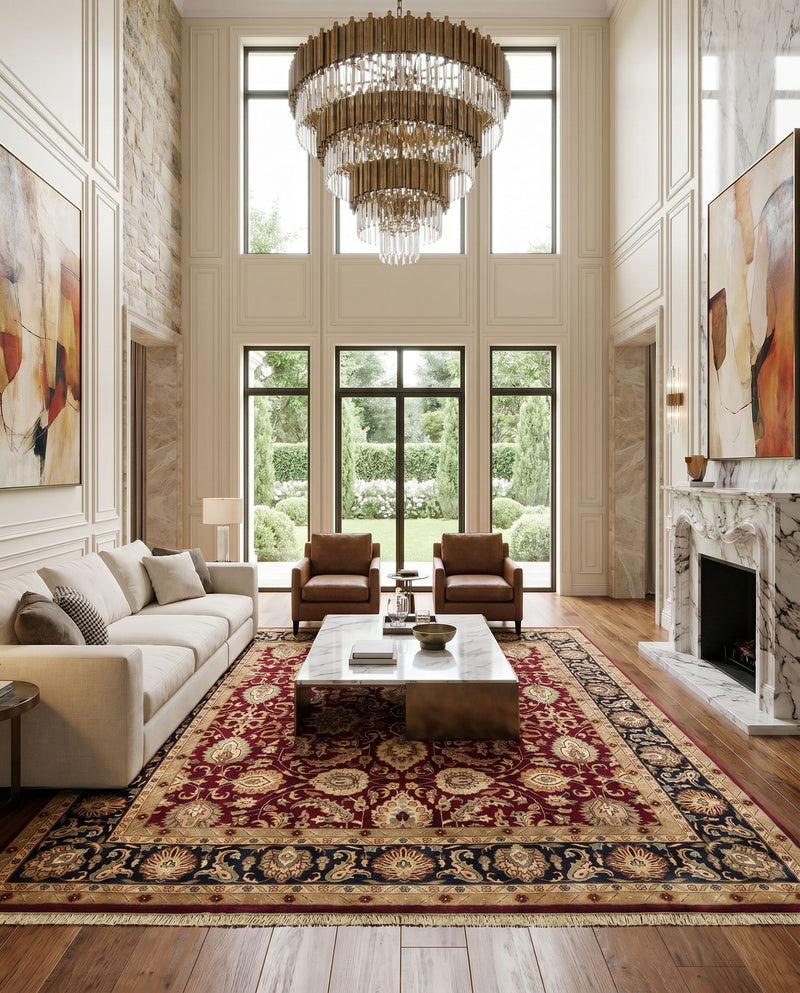 Taj Mahal TJ-6575 Hand Knotted Rug as the centerpiece of a bright luxury living room — a hand knotted traditional area rug in rust, black, mustard and light brown tones