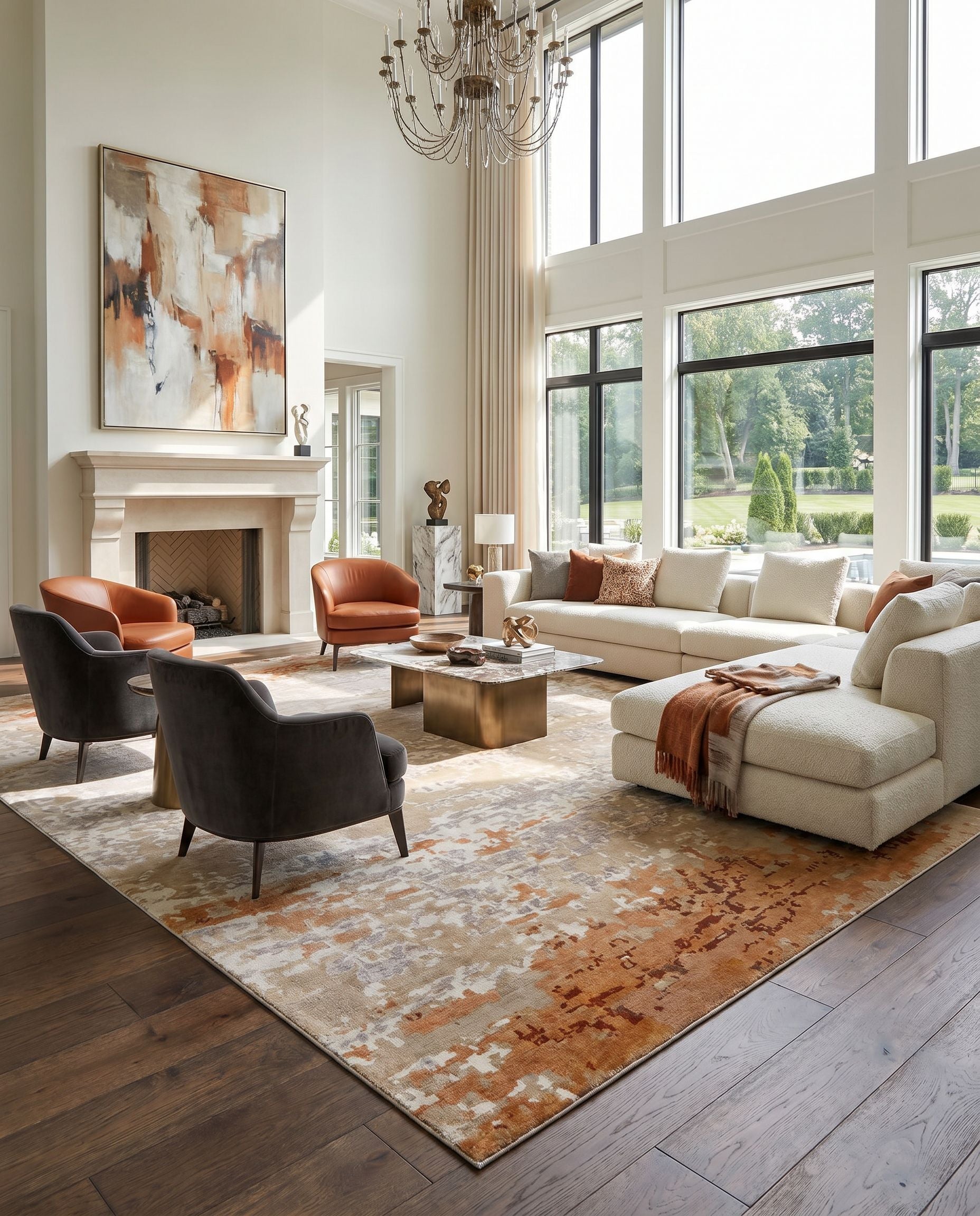 Ephemeral EPH-1001 Hand Knotted Rug as the centerpiece of a bright luxury living room — a hand knotted modern area rug in rust, camel, tan and light gray tones