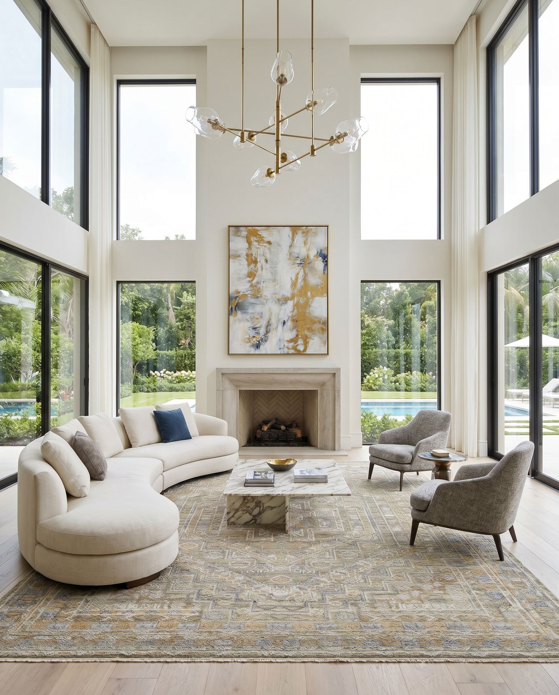 Nobility NBI-2314 Hand Knotted Rug as the centerpiece of a bright luxury living room — a hand knotted traditional area rug in tan, charcoal, wheat and light gray tones