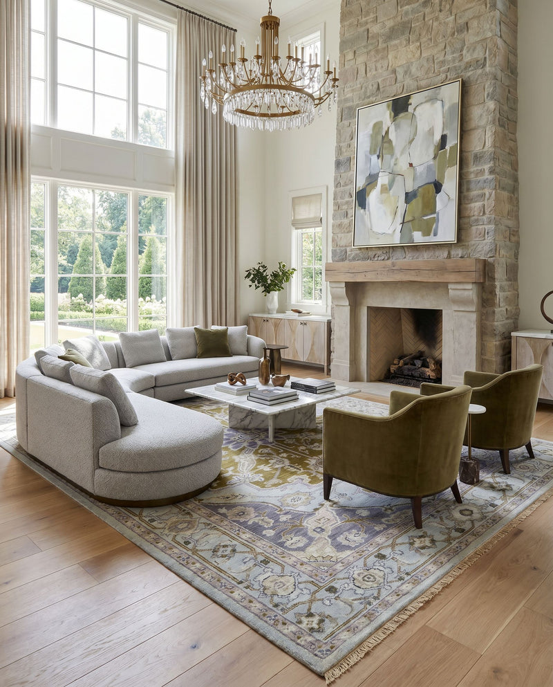 Zeus ZEU-7823 Hand Knotted Rug as the centerpiece of a bright luxury living room — a hand knotted traditional area rug in slate, navy, olive and mauve tones