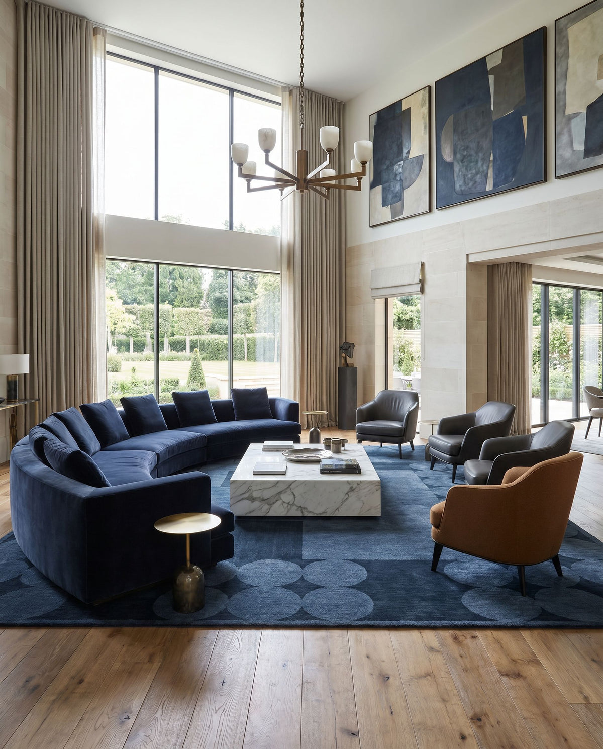 Mystique M-5479 Hand Loomed Rug as the centerpiece of a bright luxury living room — a hand loomed modern area rug in navy tones