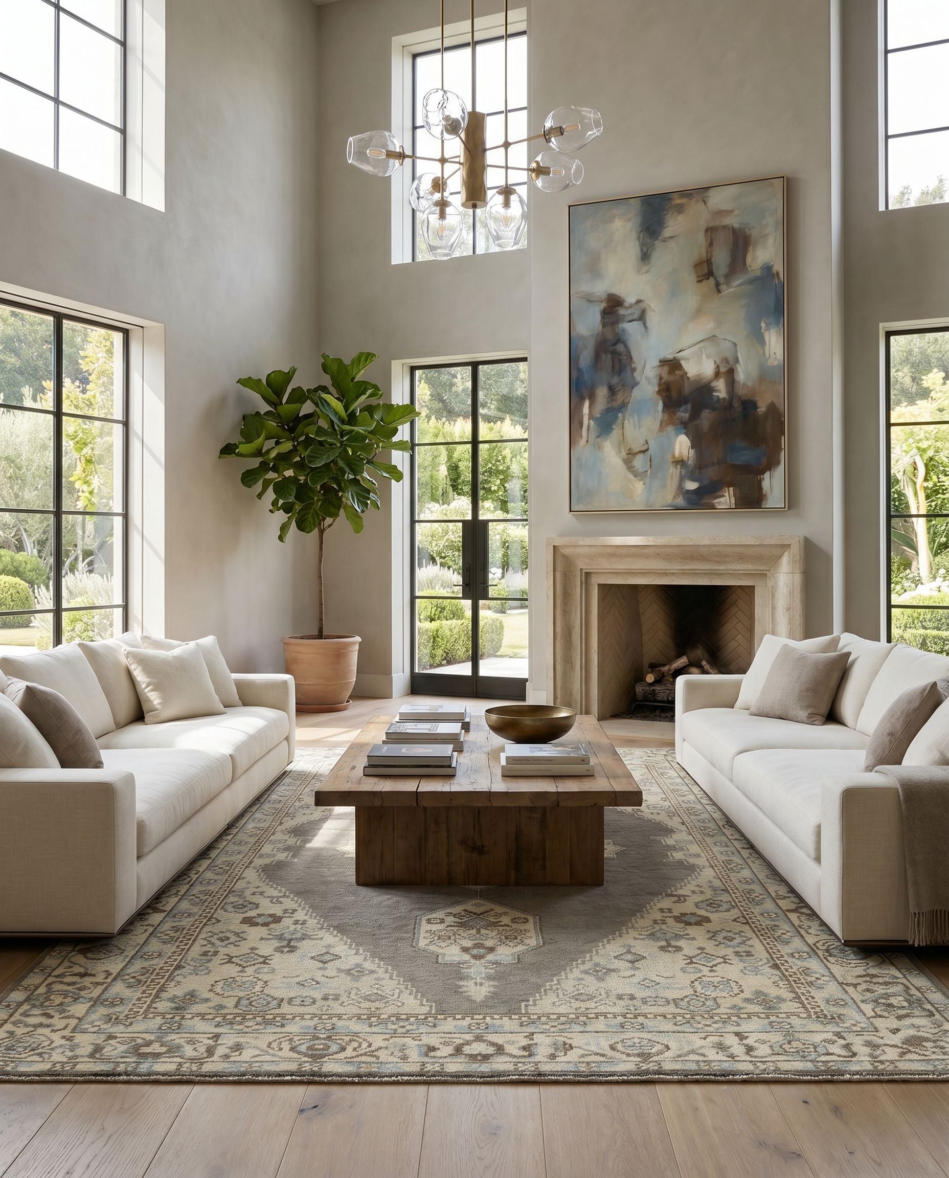 Palais PAL-2304 Hand Knotted Rug as the centerpiece of a bright luxury living room — a hand knotted traditional area rug in charcoal, denim, light beige and dark brown tones