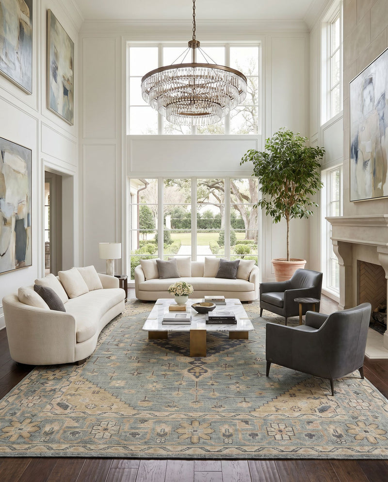 Zahra ZHA-2302 Hand Knotted Rug as the centerpiece of a bright luxury living room — a hand knotted traditional area rug in dusty sage, light sage, blush and light olive tones