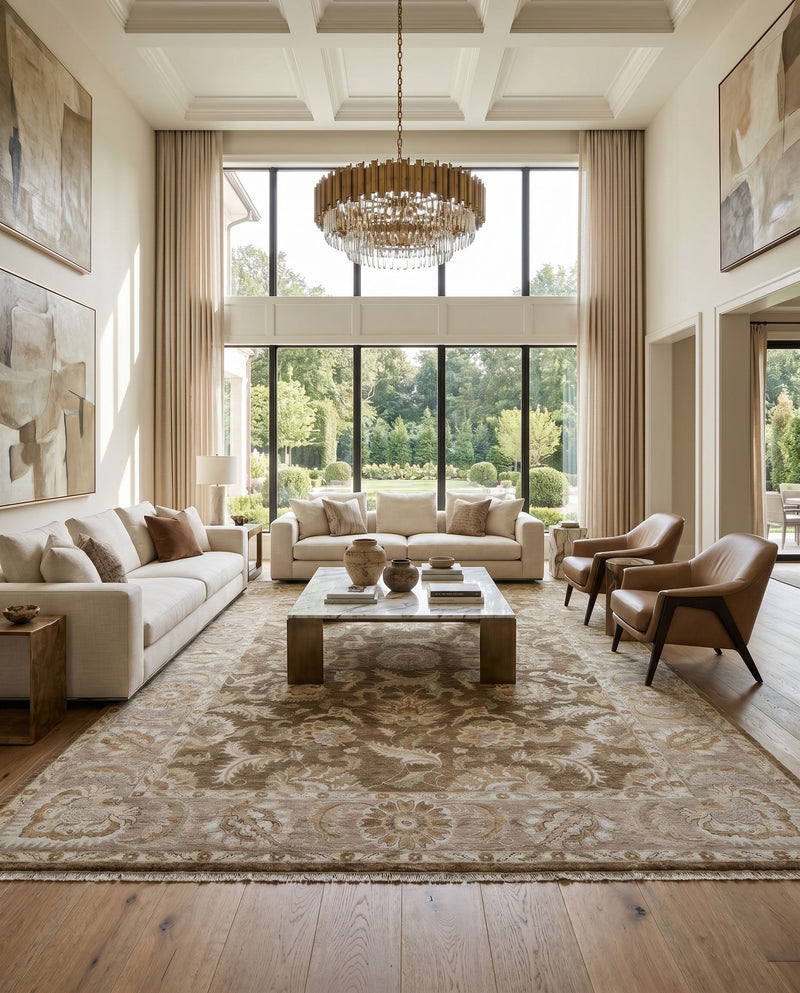 Timeless TIM-7907 Hand Knotted Rug as the centerpiece of a bright luxury living room — a hand knotted traditional area rug in gray, tan, brown and light brown tones