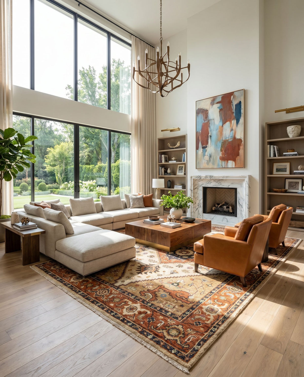 Biscayne BSY-2302 Hand Knotted Rug as the centerpiece of a bright luxury living room — a hand knotted traditional area rug in aqua, ink blue, tan and rust tones