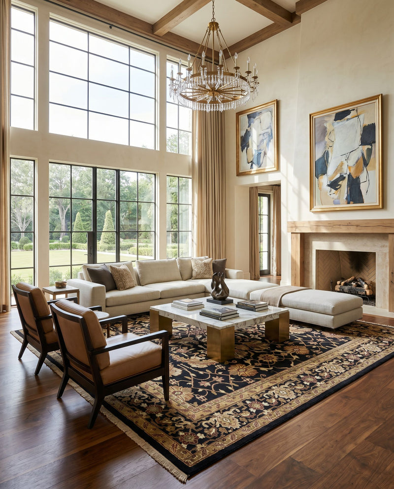 Taj Mahal TJ-44 Hand Knotted Rug as the centerpiece of a bright luxury living room — a hand knotted traditional area rug in black, mustard, burnt orange and olive tones