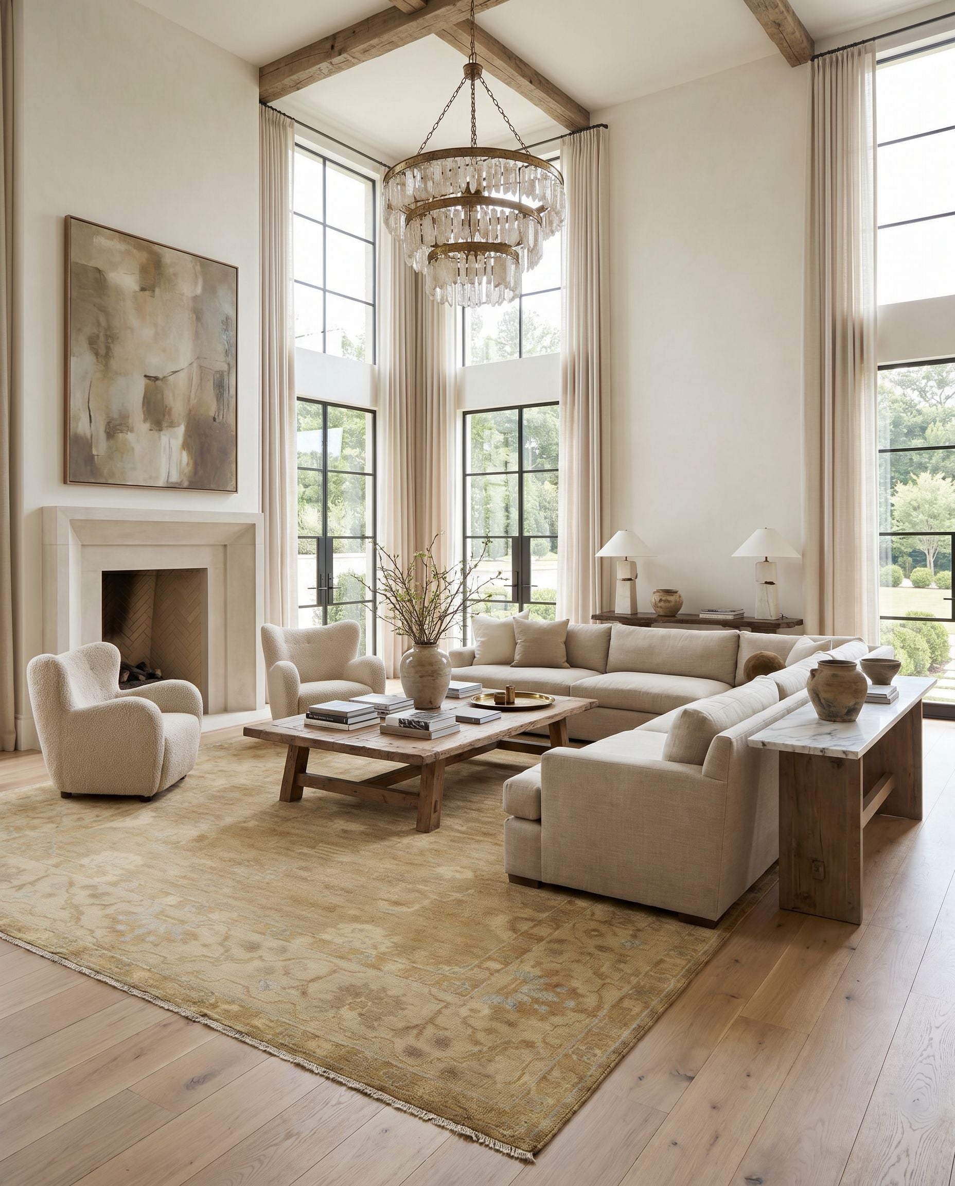 Antique ATQ-1001 Hand Knotted Rug as the centerpiece of a bright luxury living room — a hand knotted traditional area rug in mustard, tan, dusty pink and slate tones