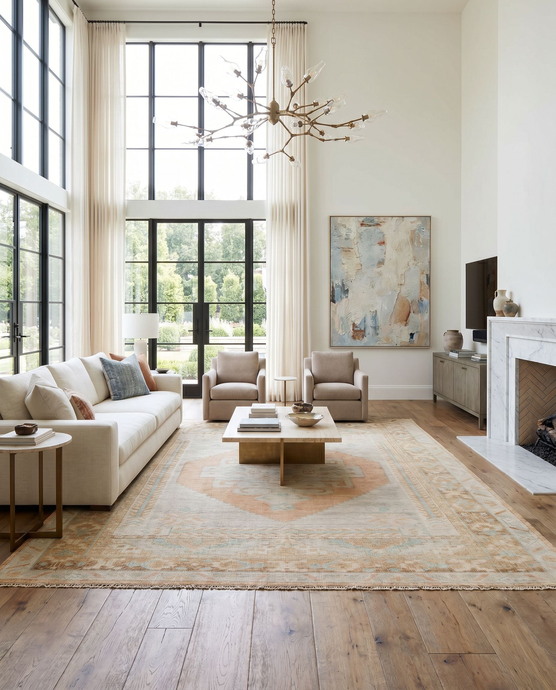 Anadolu AAU-2306 Hand Knotted Rug as the centerpiece of a bright luxury living room — a hand knotted traditional area rug in seafoam, beige, pale blue and light blue tones