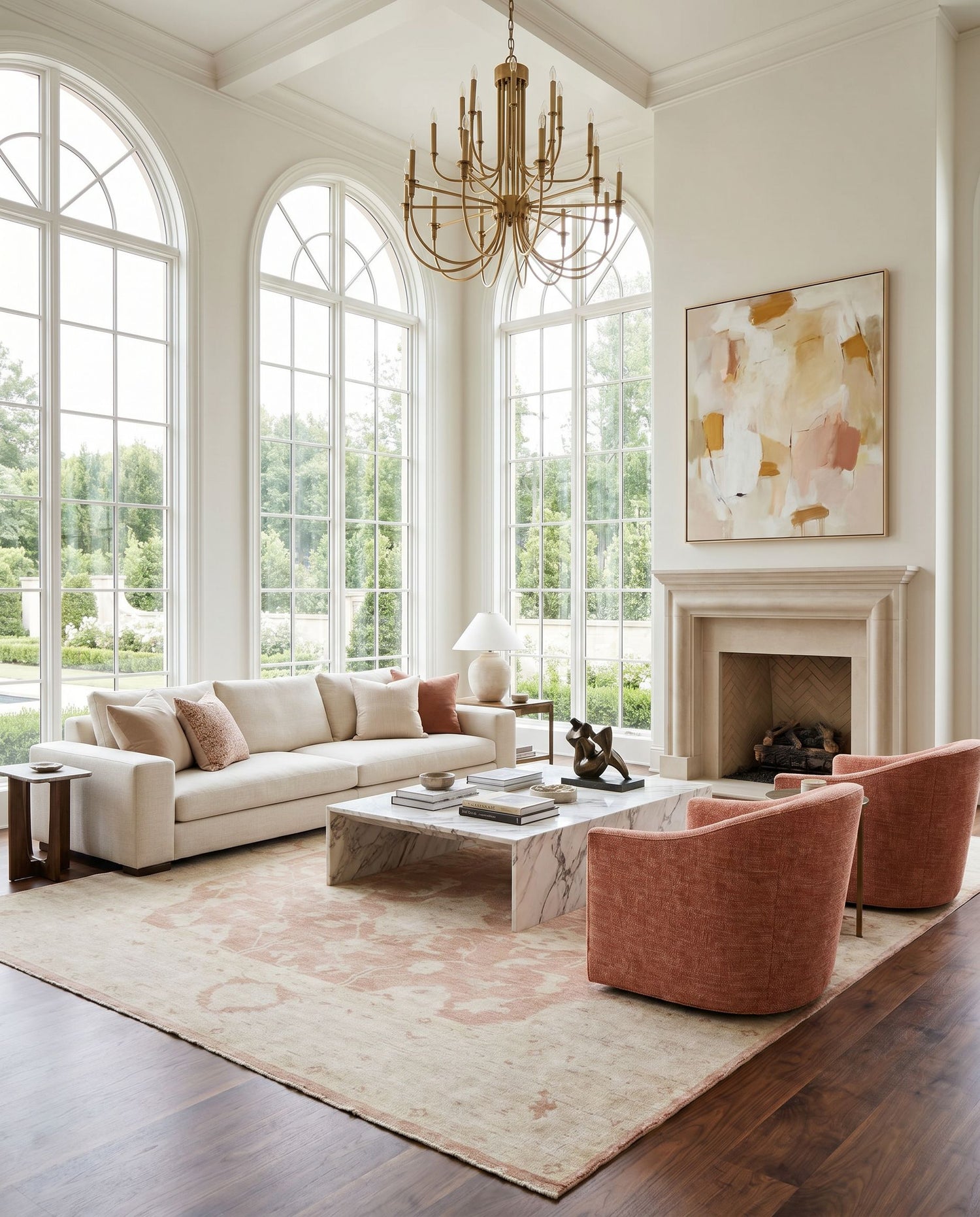 Normandy NOY-8000 Hand Knotted Rug as the centerpiece of a bright luxury living room — a hand knotted traditional area rug in beige, dusty pink and light gray tones