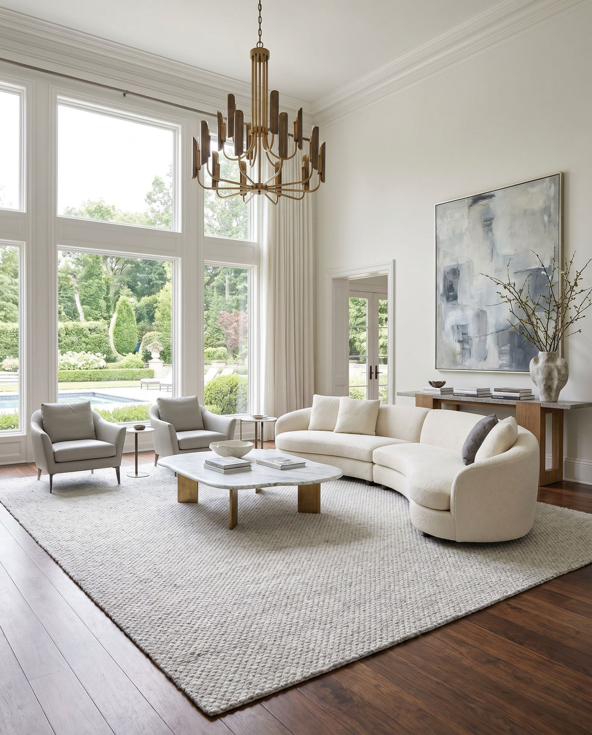 Empoli EPO-2311 Hand Woven Rug as the centerpiece of a bright luxury living room — a hand woven cottage area rug in ivory, dove gray and pearl tones