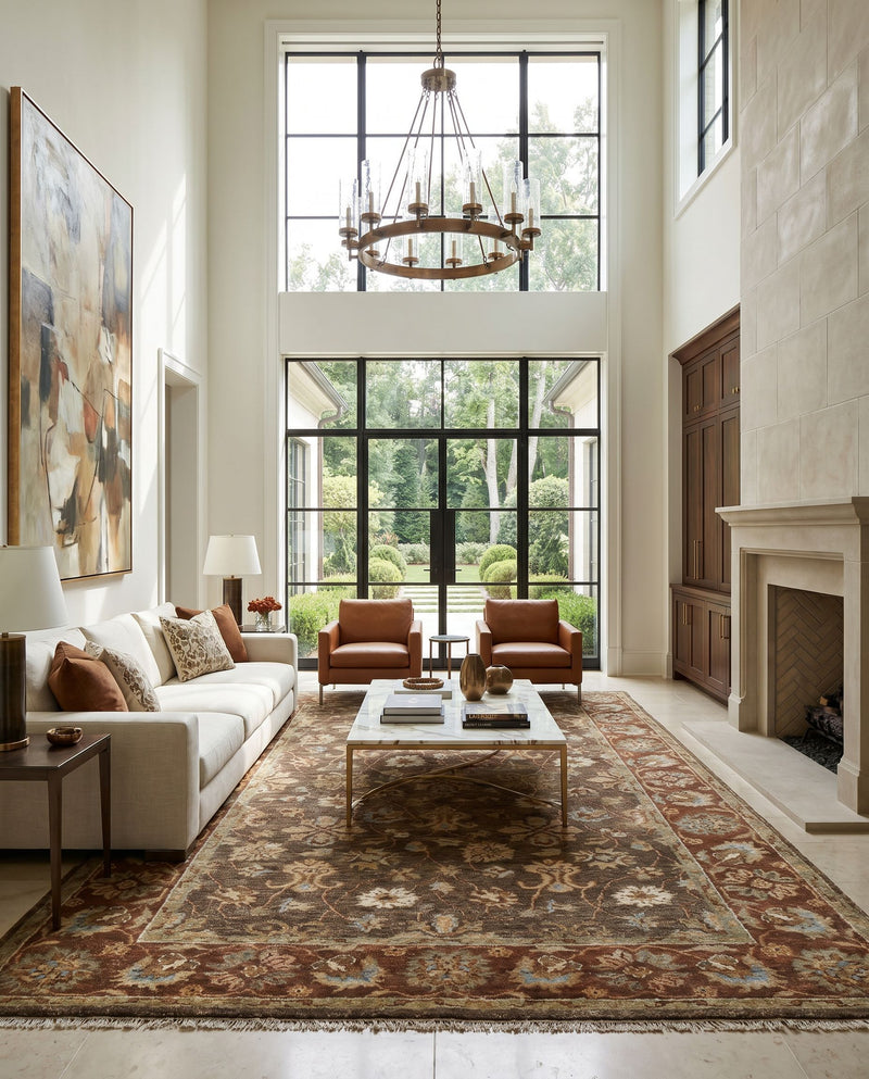 Estate EST-10506 Hand Knotted Rug as the centerpiece of a bright luxury living room — a hand knotted traditional area rug in dark brown, rust, brown and dusty sage tones