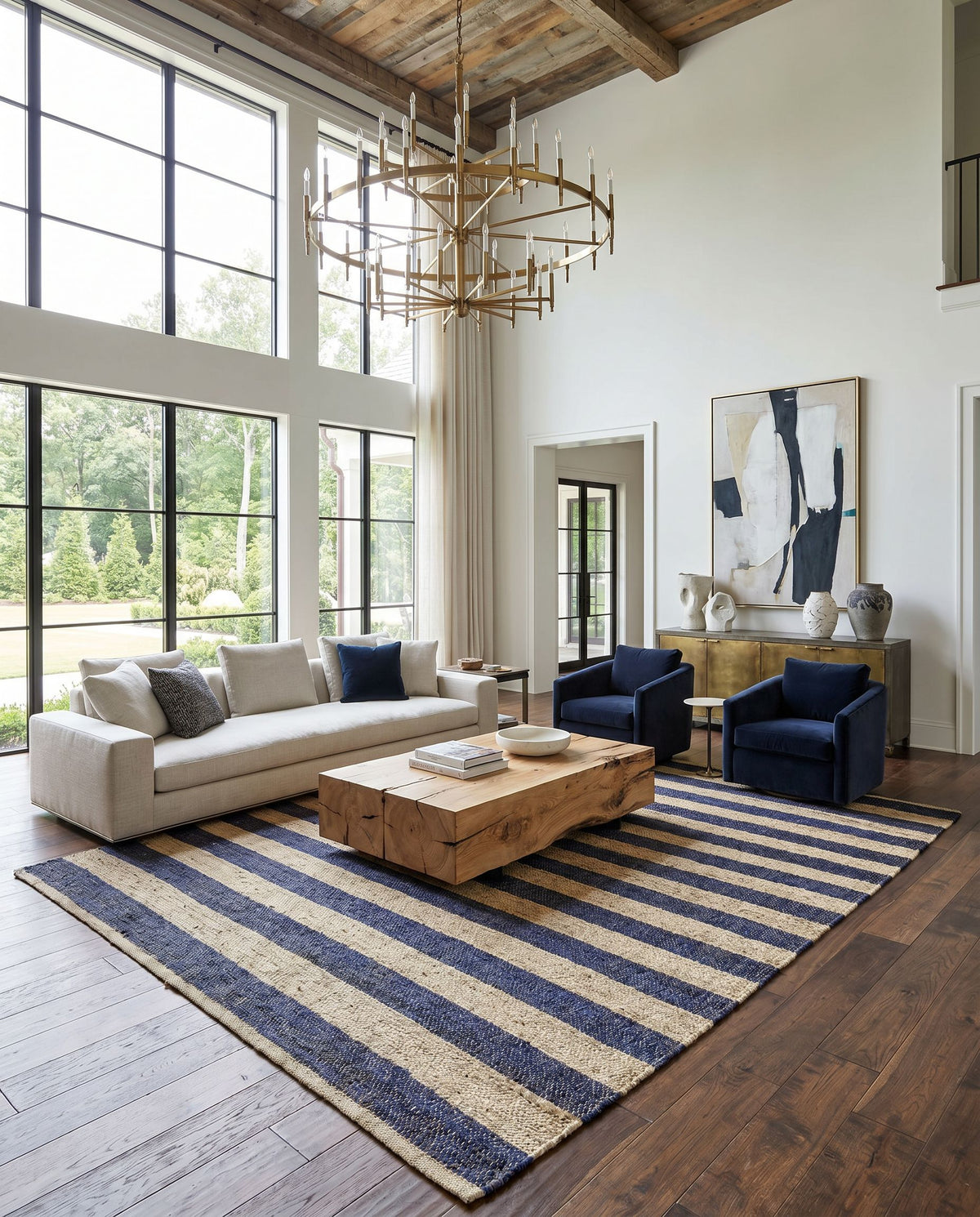 Atina ATA-2302 Hand Woven Rug as the centerpiece of a bright luxury living room — a hand woven cottage area rug in navy and beige tones