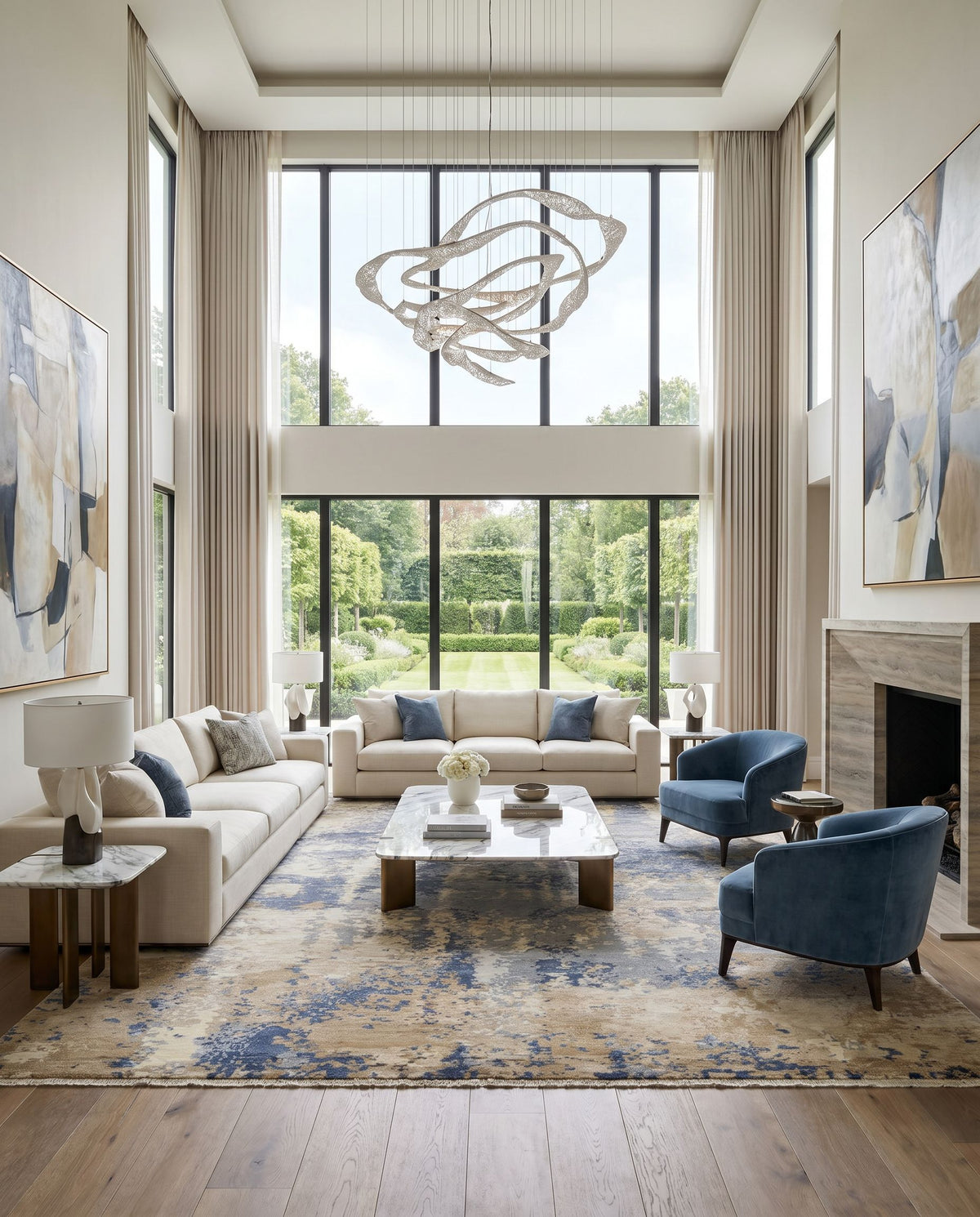 Emery EYM-2300 Hand Knotted Rug as the centerpiece of a bright luxury living room — a hand knotted modern area rug in gray, oatmeal, charcoal and beige tones