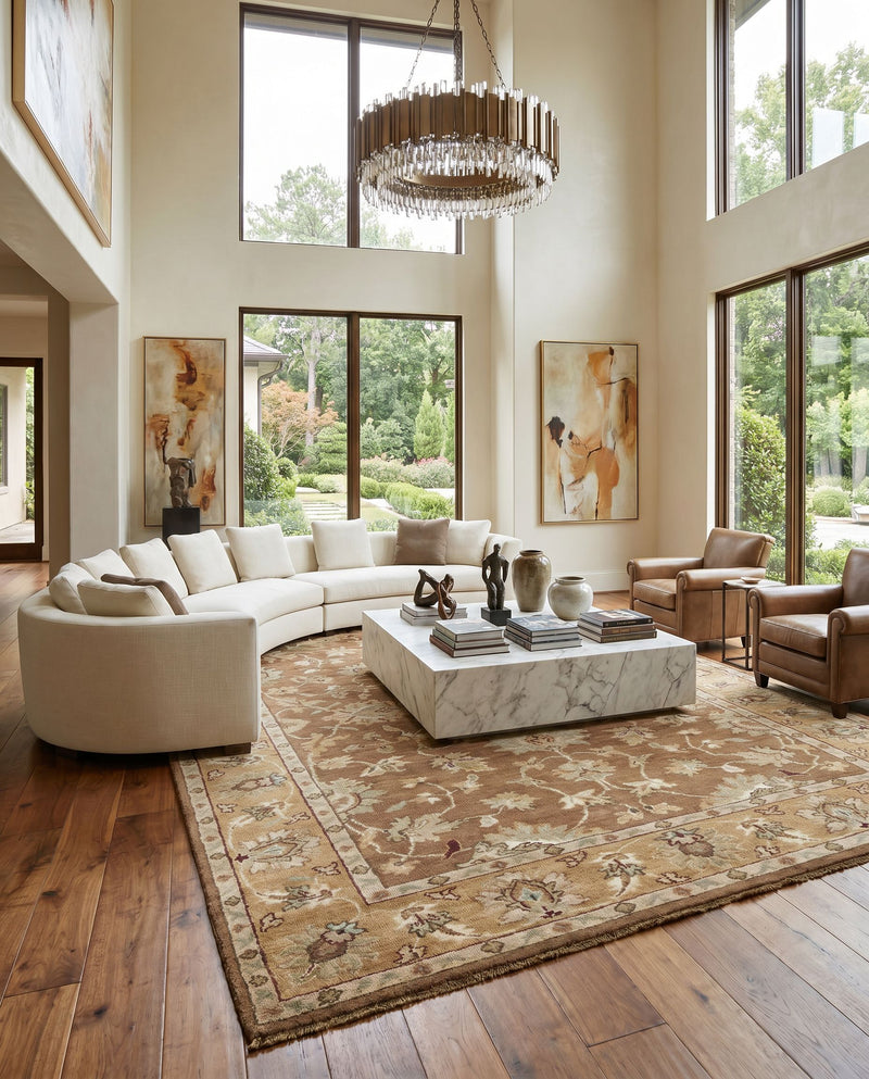 Estate EST-10503 Hand Knotted Rug as the centerpiece of a bright luxury living room — a hand knotted traditional area rug in camel, sage, dusty pink and dark brown tones