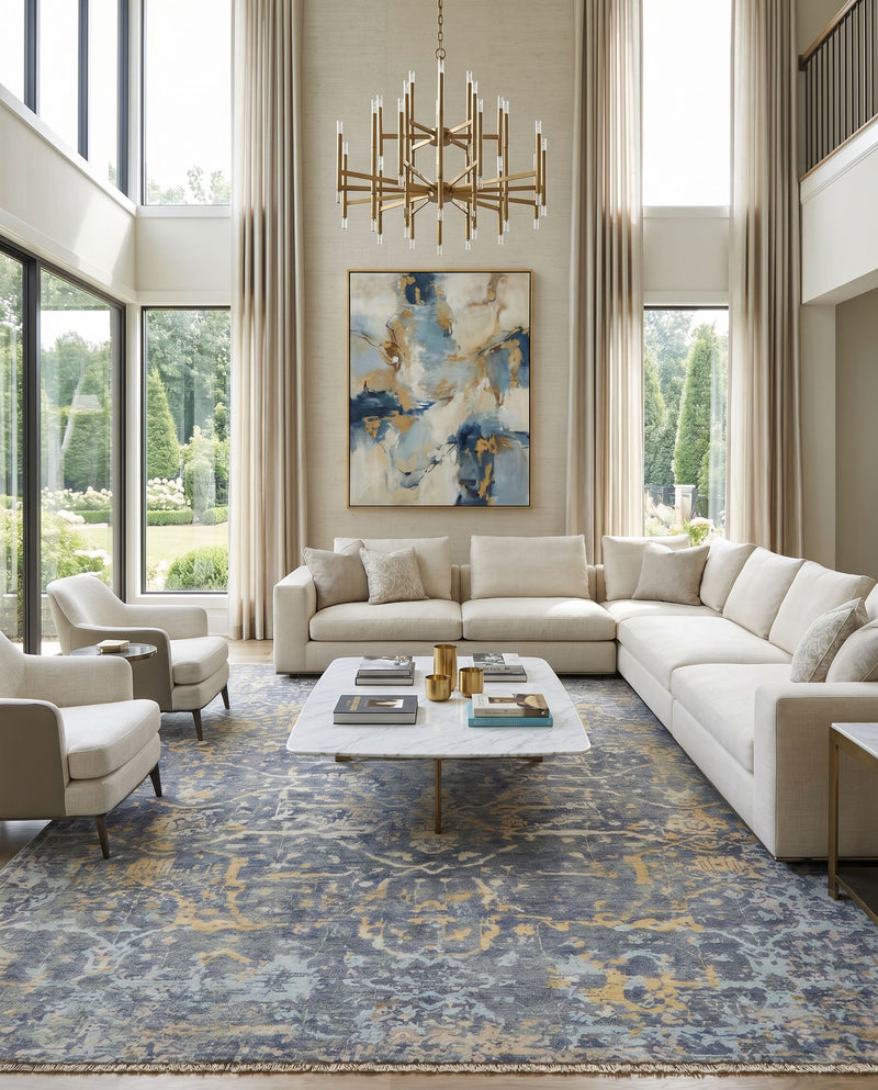 Normandy NOY-8005 Hand Knotted Rug as the centerpiece of a bright luxury living room — a hand knotted traditional area rug in blue, dusty sage, wheat and light blue tones