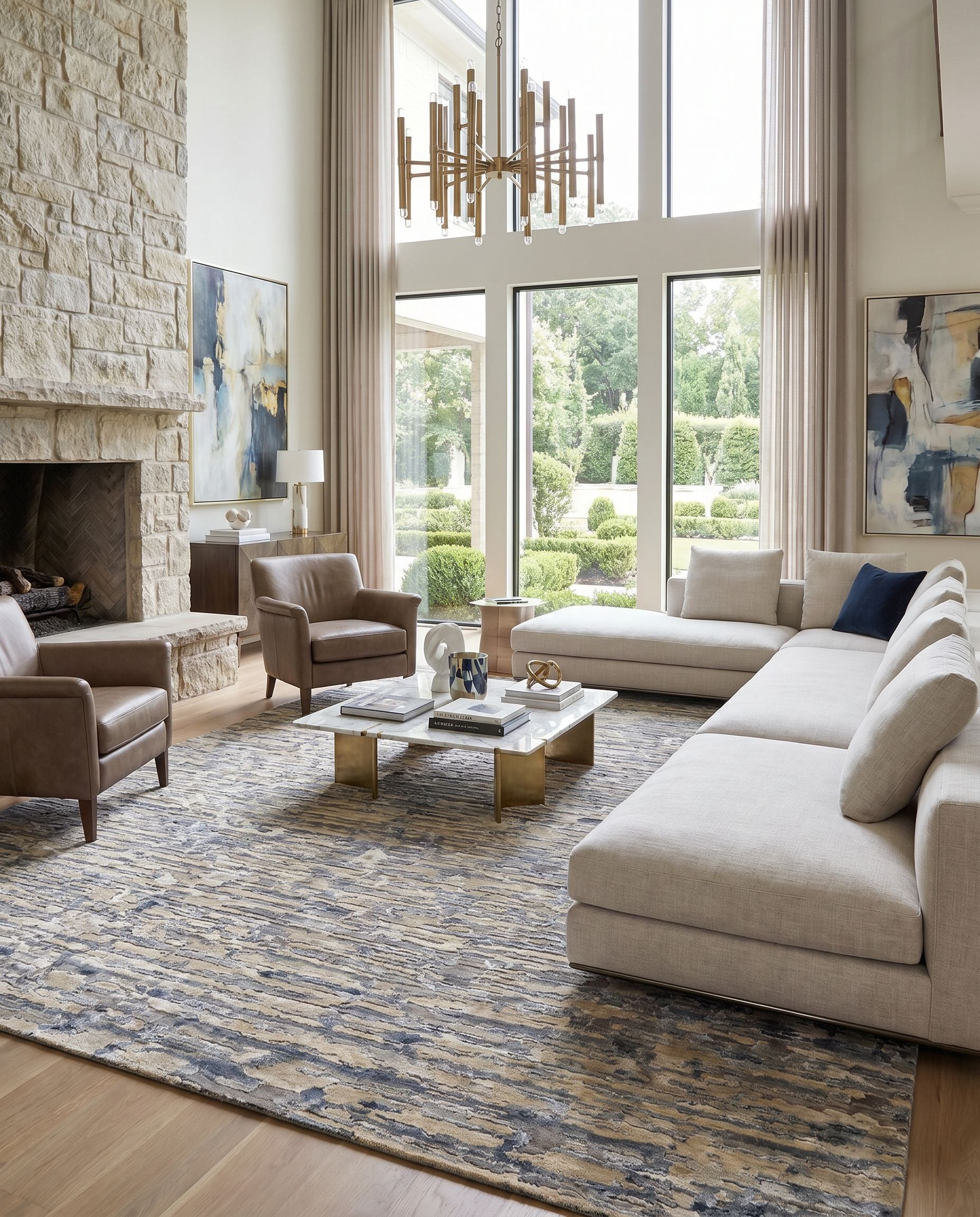 Seda SSD-2302 Hand Knotted Rug as the centerpiece of a bright luxury living room — a hand knotted modern area rug in black, medium gray, taupe and light beige tones