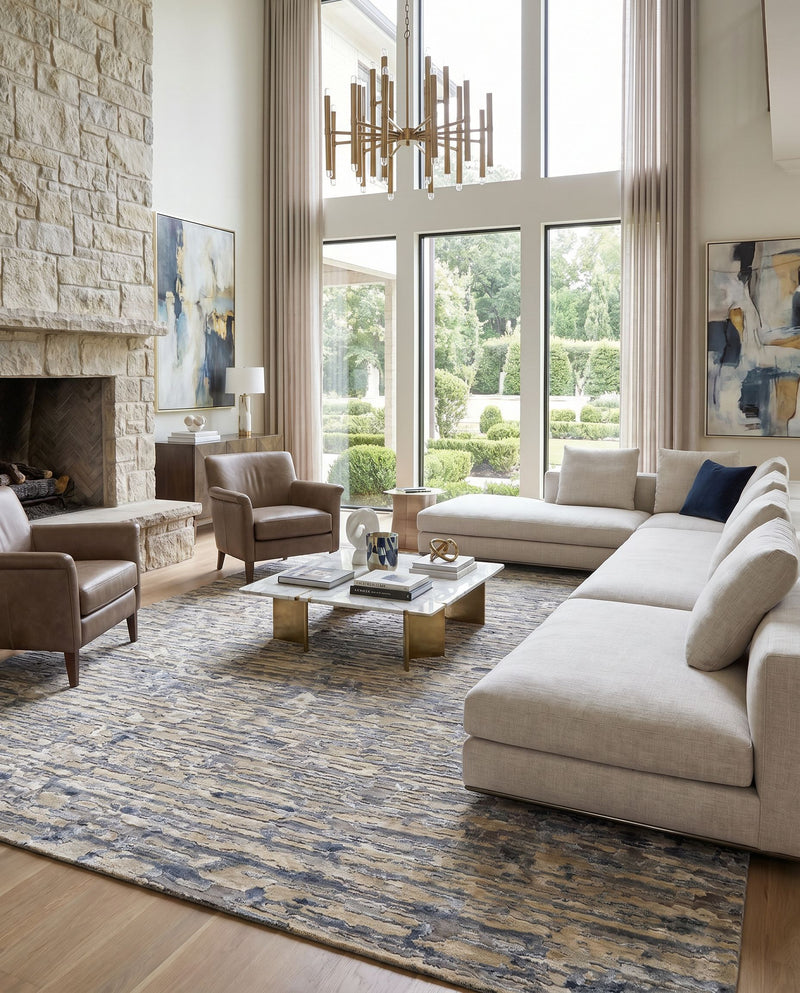 Seda SSD-2302 Hand Knotted Rug as the centerpiece of a bright luxury living room — a hand knotted modern area rug in black, medium gray, taupe and light beige tones