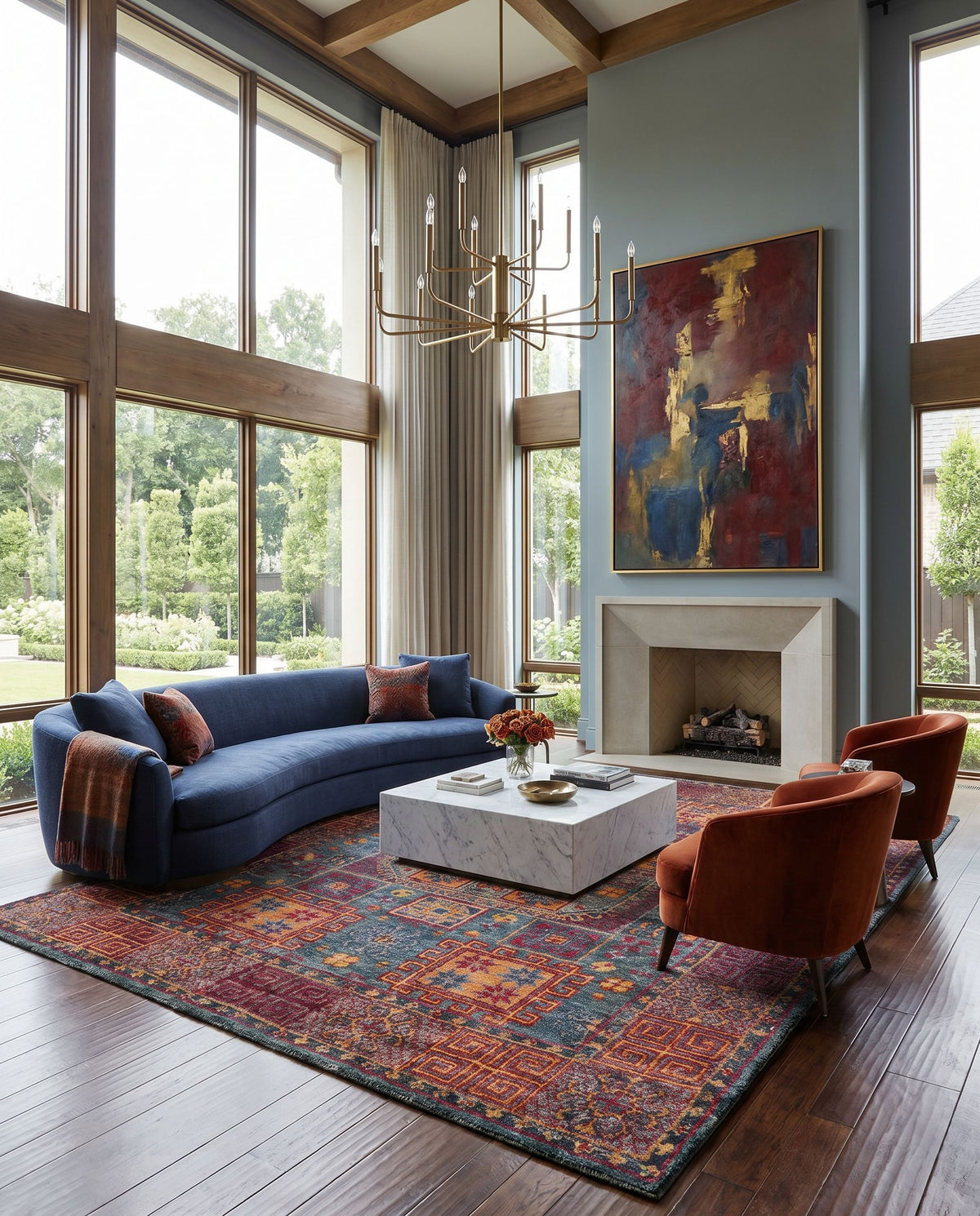 Scarborough SCR-5160 Hand Knotted Rug as the centerpiece of a bright luxury living room — a hand knotted traditional area rug in dark green, red, mustard and burnt orange tones