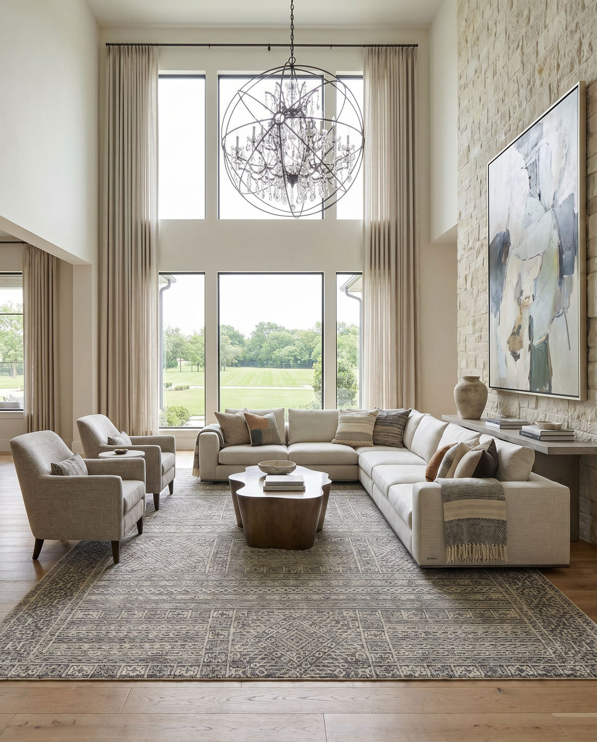 Oakland OAA-1009 Hand Tufted Rug styled in an elegant designer living room — hand tufted global area rug in black, gray and taupe tones