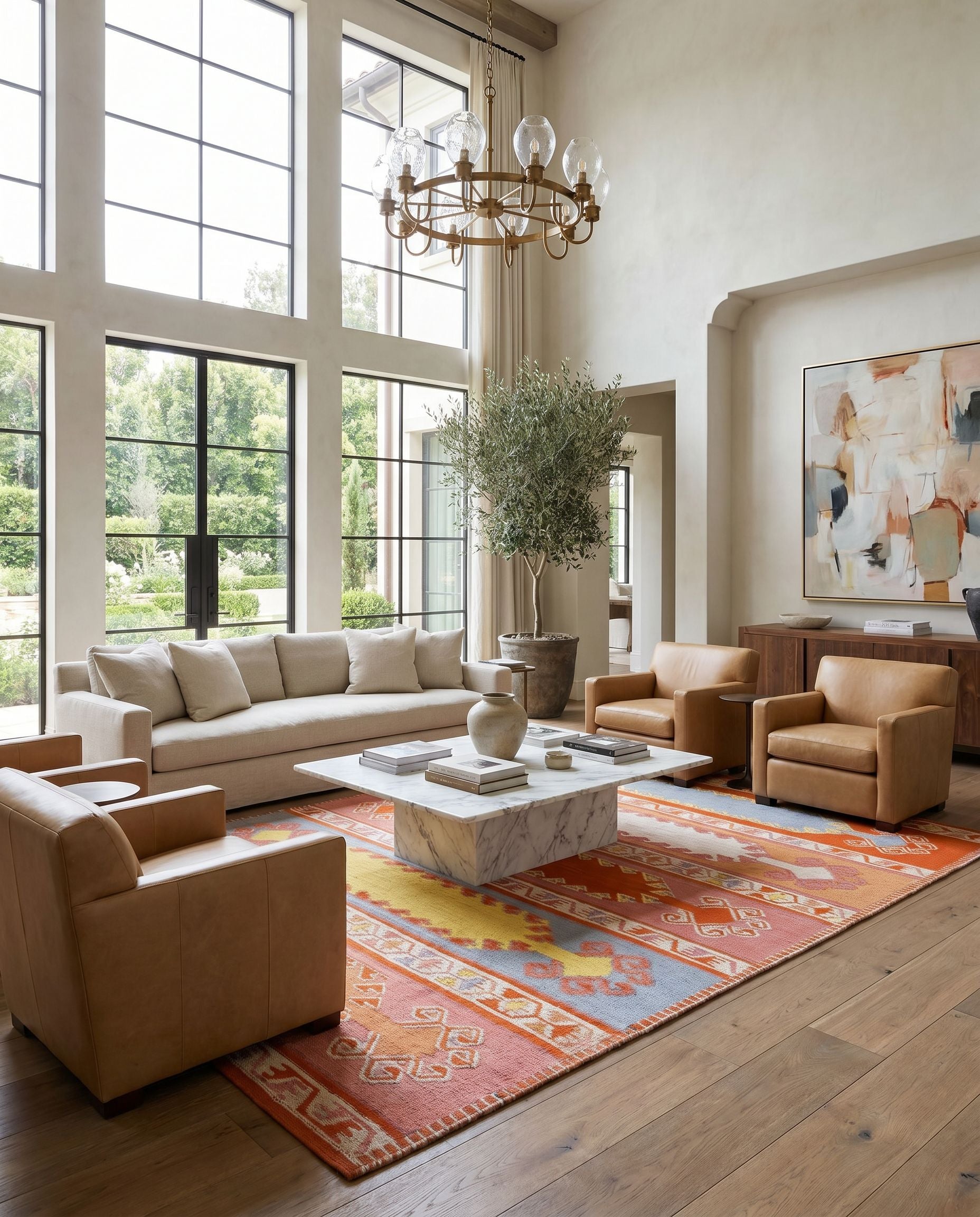 Sajal SAJ-1064 Hand Woven Rug styled in an elegant designer living room — hand woven global area rug in rust, camel, ivory and rose tones