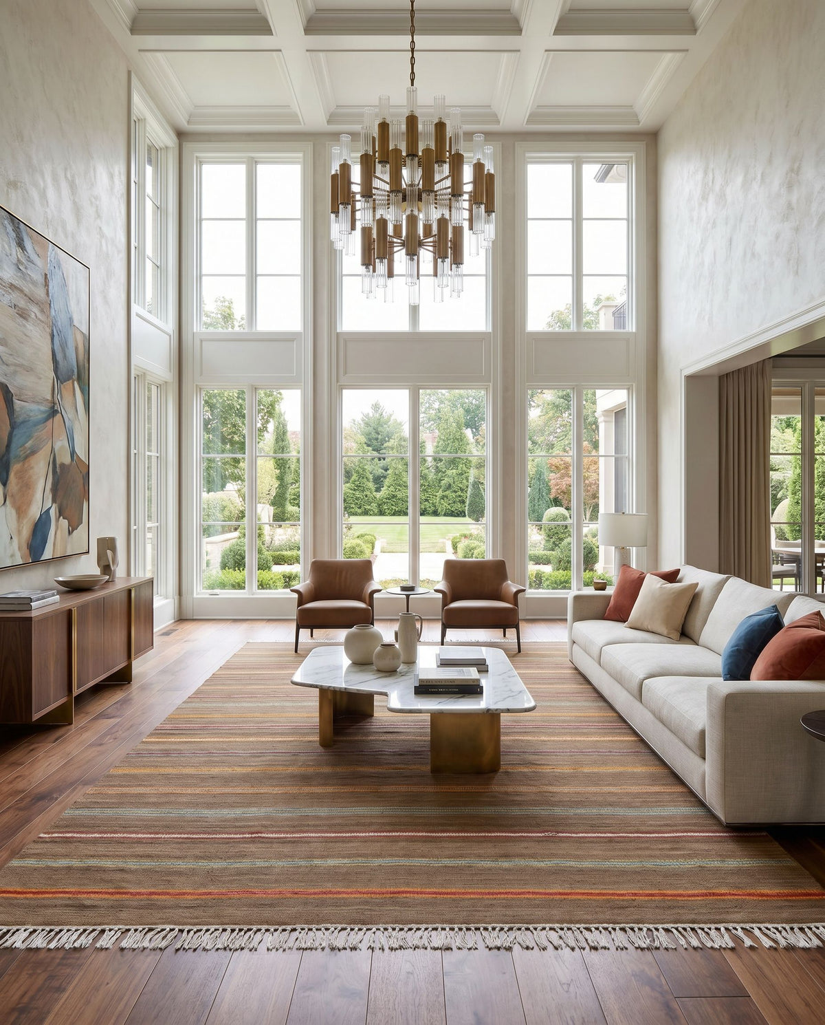 Miguel MIG-5007 Hand Woven Rug styled in an elegant designer living room — hand woven cottage area rug in dark brown, light blue, burgundy and olive tones