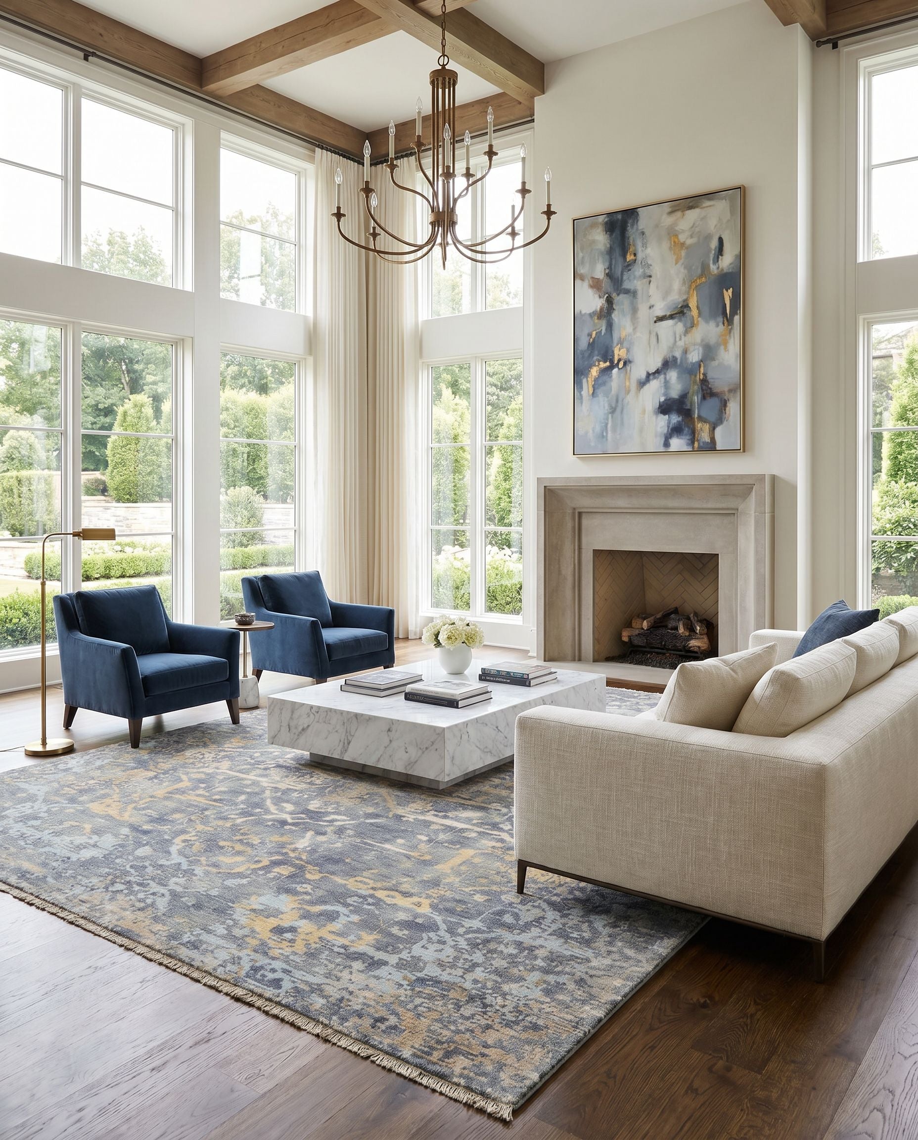Normandy NOY-8005 Hand Knotted Rug styled in an elegant designer living room — hand knotted traditional area rug in blue, dusty sage, wheat and light blue tones