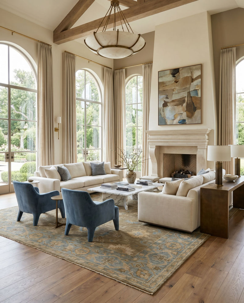 Reign REG-2315 Hand Knotted Rug styled in an elegant designer living room — hand knotted traditional area rug in dusty sage, denim, tan and ivory tones