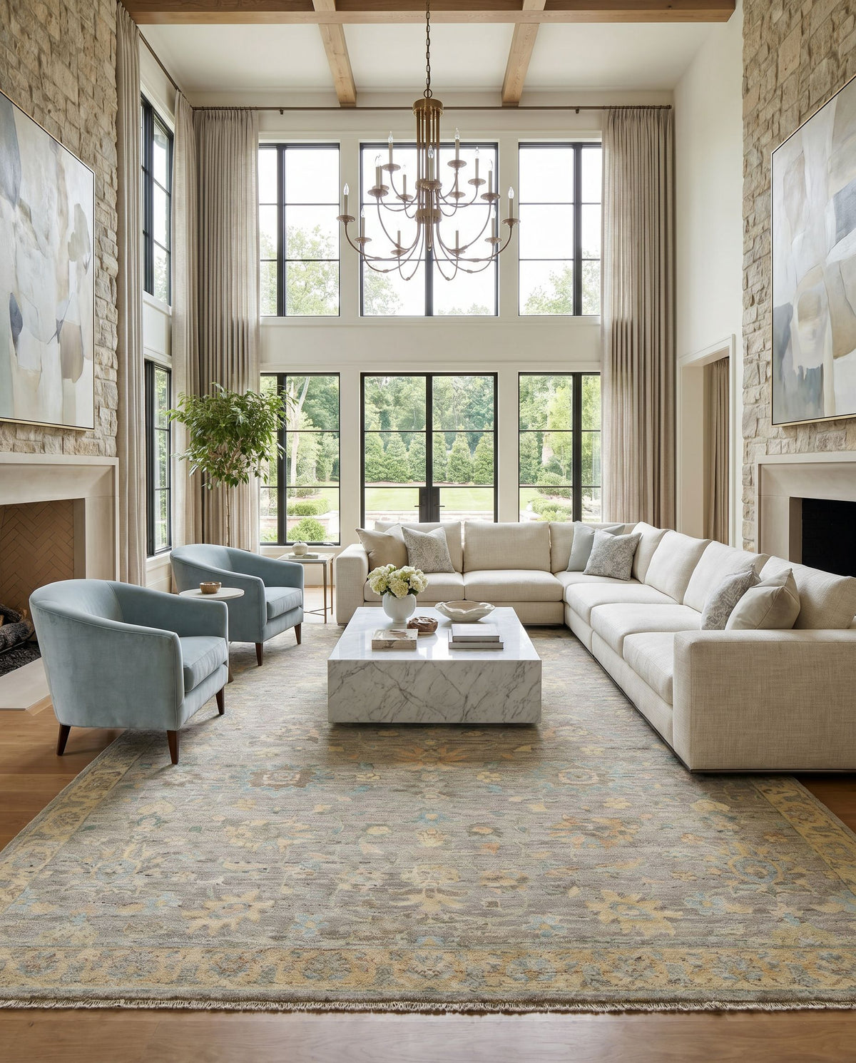 Ghazni GHZ-2301 Hand Knotted Rug styled in an elegant designer living room — hand knotted traditional area rug in ice blue, medium gray, gray and tan tones