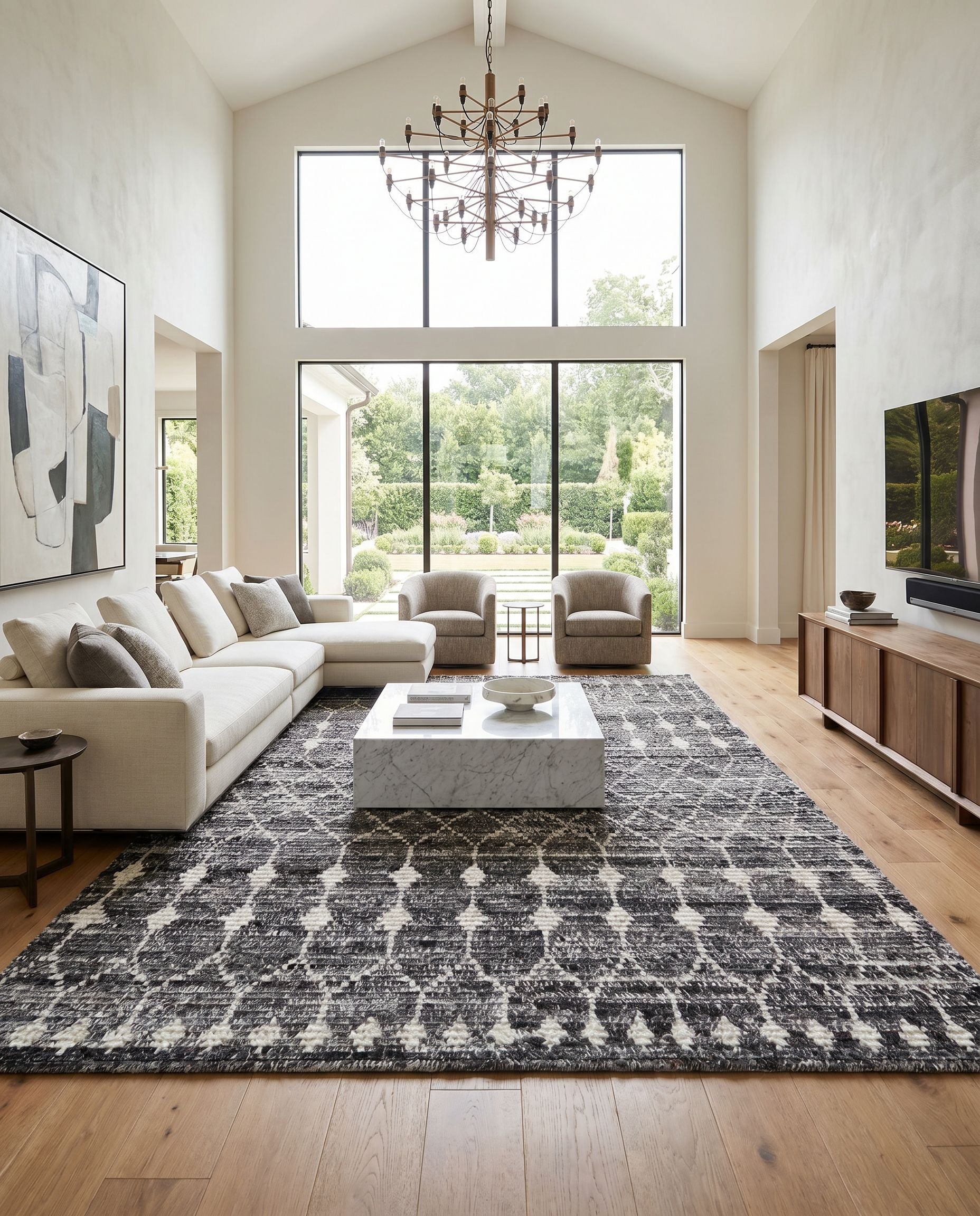 Birch BHC-2301 Hand Knotted Rug styled in an elegant designer living room — hand knotted global area rug in black, charcoal, medium gray and light gray tones
