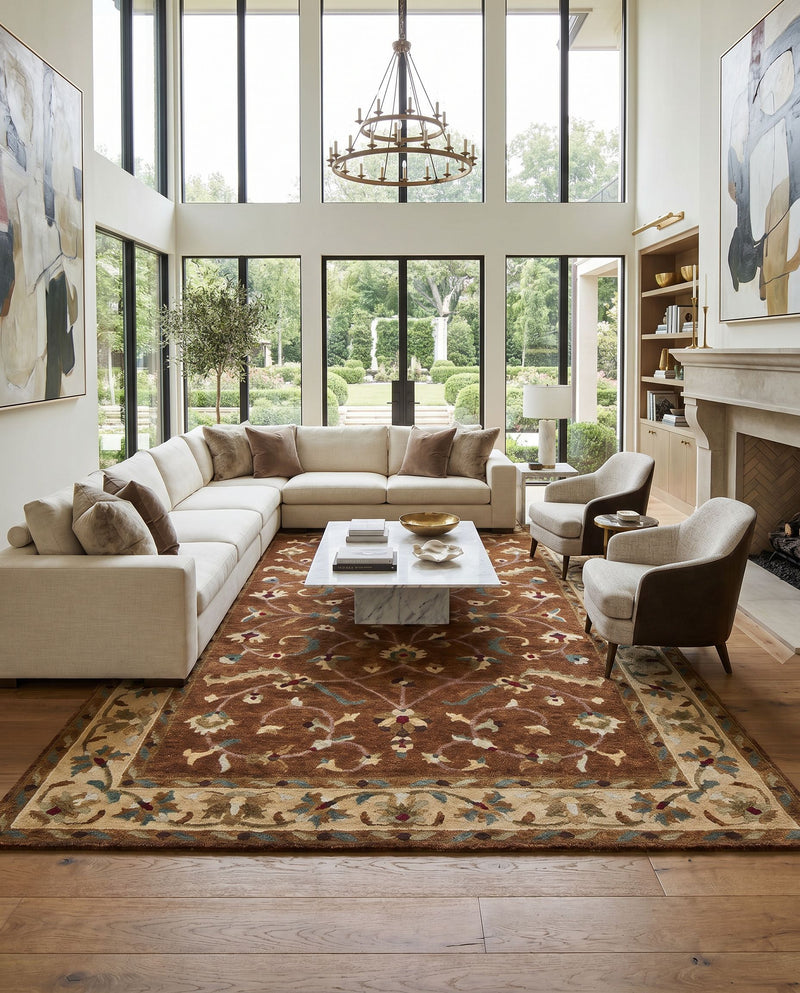 Anastacia ANA-8403 Hand Knotted Rug styled in an elegant designer living room — hand knotted traditional area rug in brown, wheat, dusty pink and pale blue tones