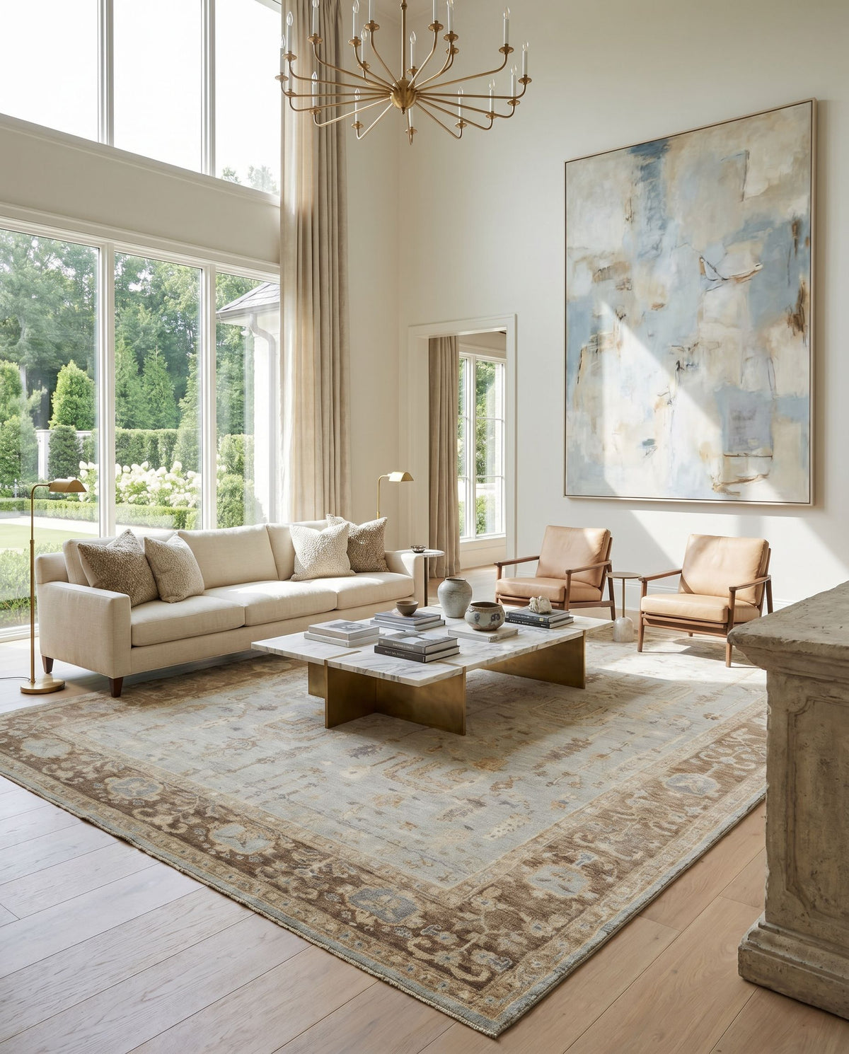 Normandy NOY-8003 Hand Knotted Rug styled in an elegant designer living room — hand knotted traditional area rug in cream, light sage, tan and medium brown tones