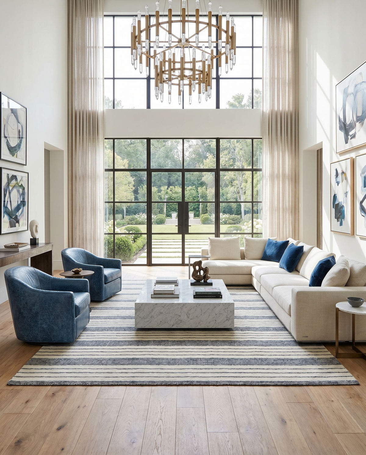 Tartan TAR-2303 Hand Woven Rug styled in an elegant designer living room — hand woven cottage area rug in light gray, gray and black tones