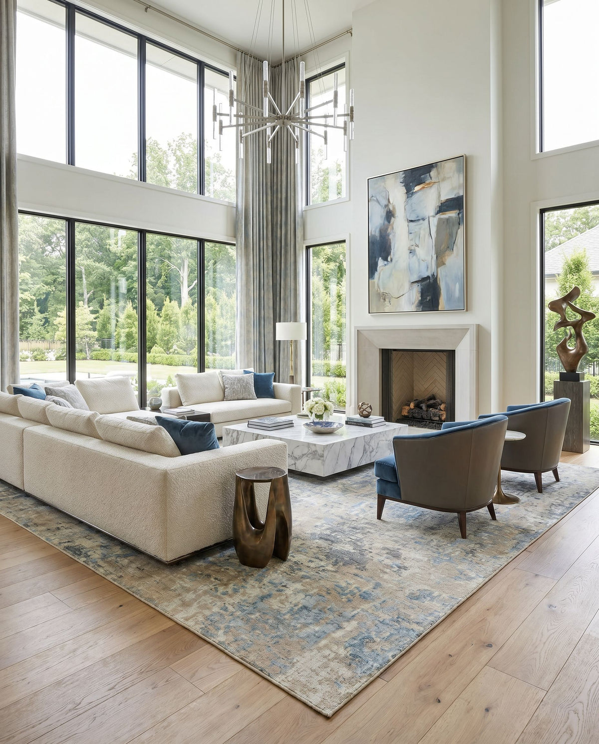 Odyssey ODY-2301 Hand Knotted Rug styled in an elegant designer living room — hand knotted modern area rug in tan, beige, denim and dark blue tones