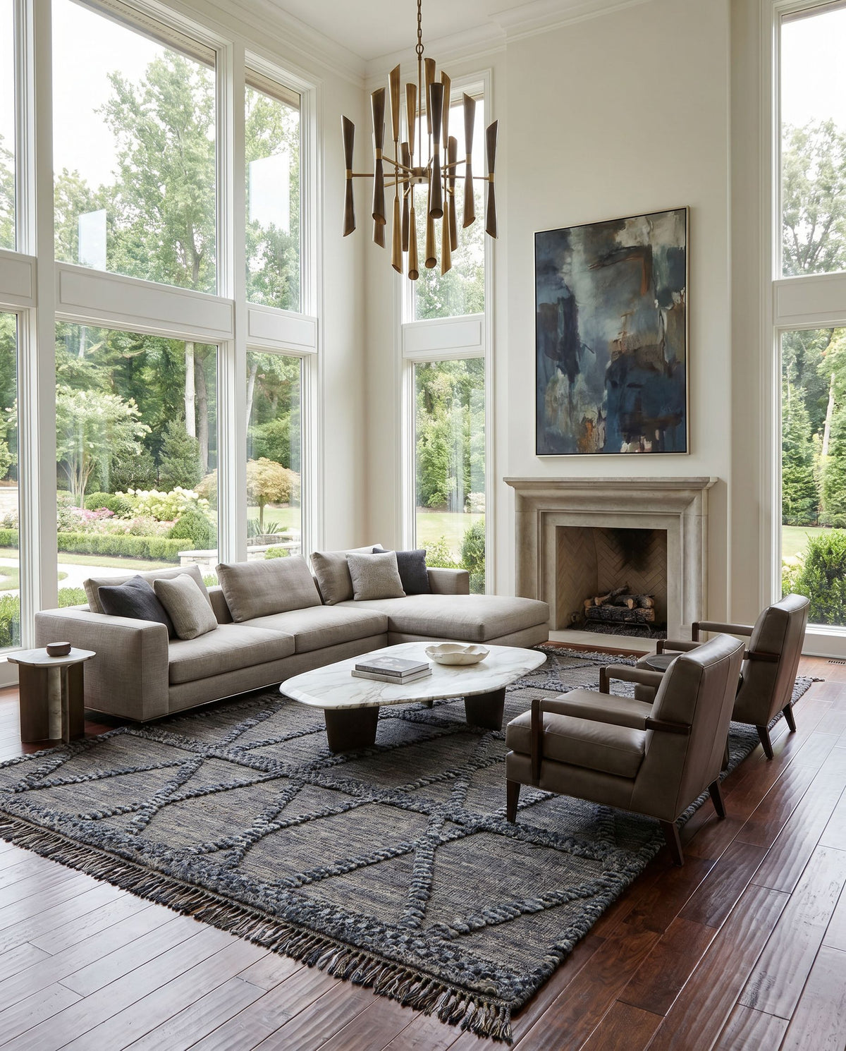 Cadiz CDZ-2302 Hand Knotted Rug styled in an elegant designer living room — hand knotted global area rug in black, gray, charcoal and dark brown tones