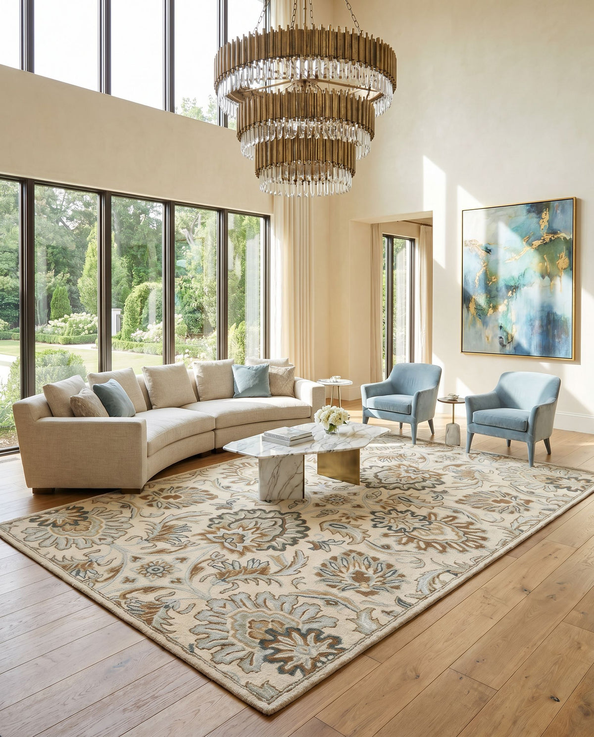 Caesar CAE-1228 Hand Tufted Rug styled in an elegant designer living room — hand tufted traditional area rug in ivory, taupe, sage and sky blue tones