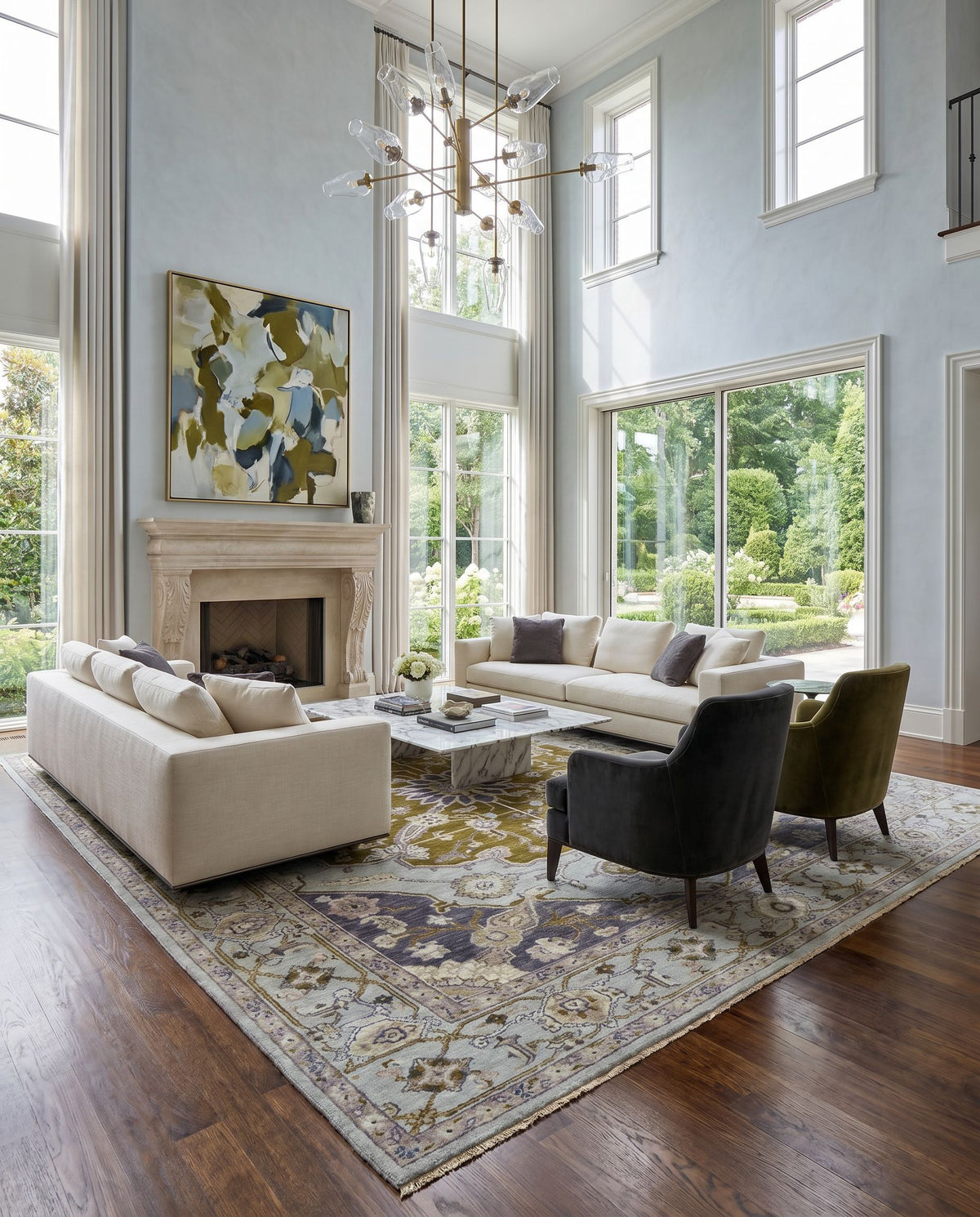 Zeus ZEU-7823 Hand Knotted Rug styled in an elegant designer living room — hand knotted traditional area rug in slate, navy, olive and mauve tones