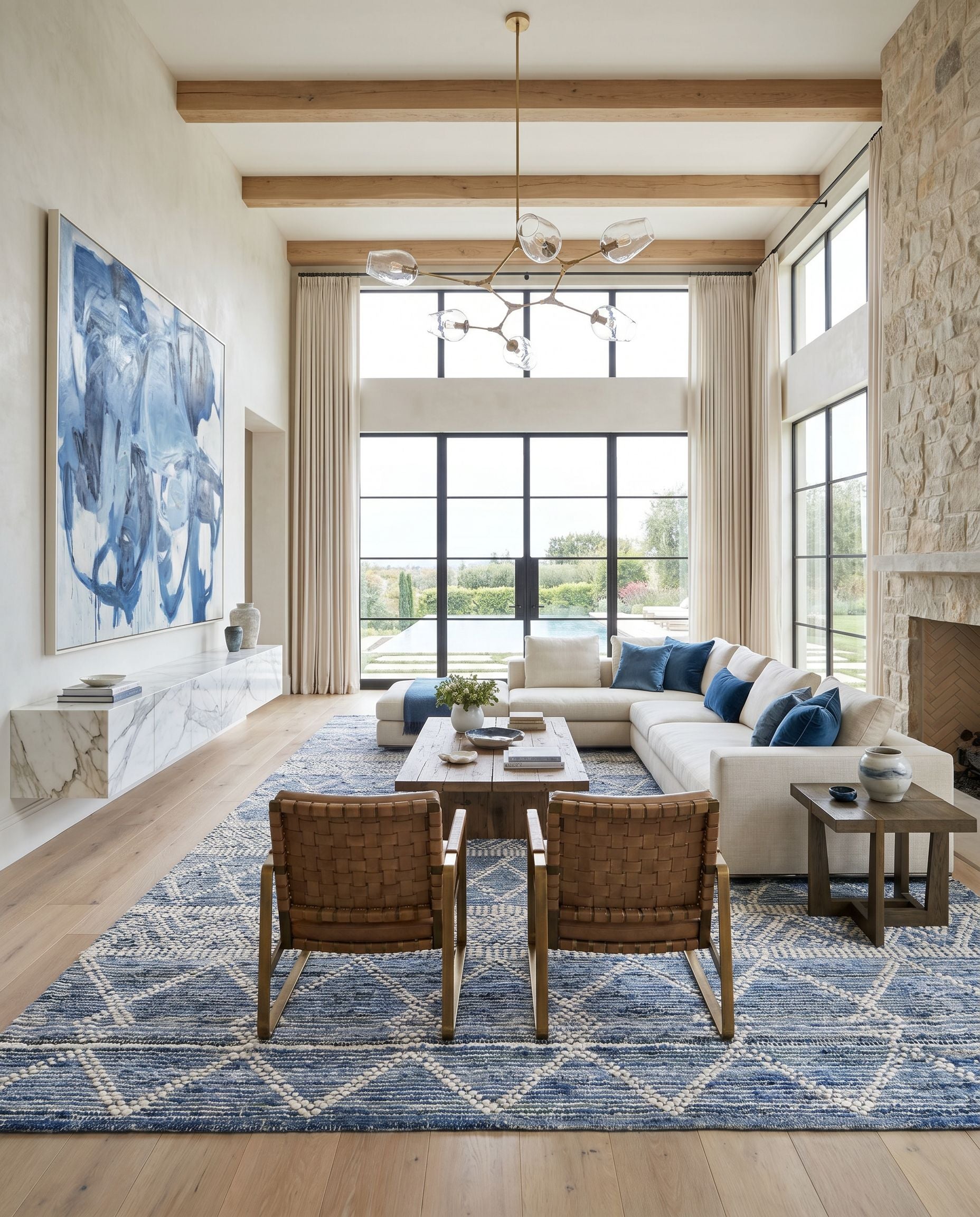 Nadine NDD-2301 Hand Woven Rug styled in an elegant designer living room — hand woven global area rug in ivory, navy and dark blue tones