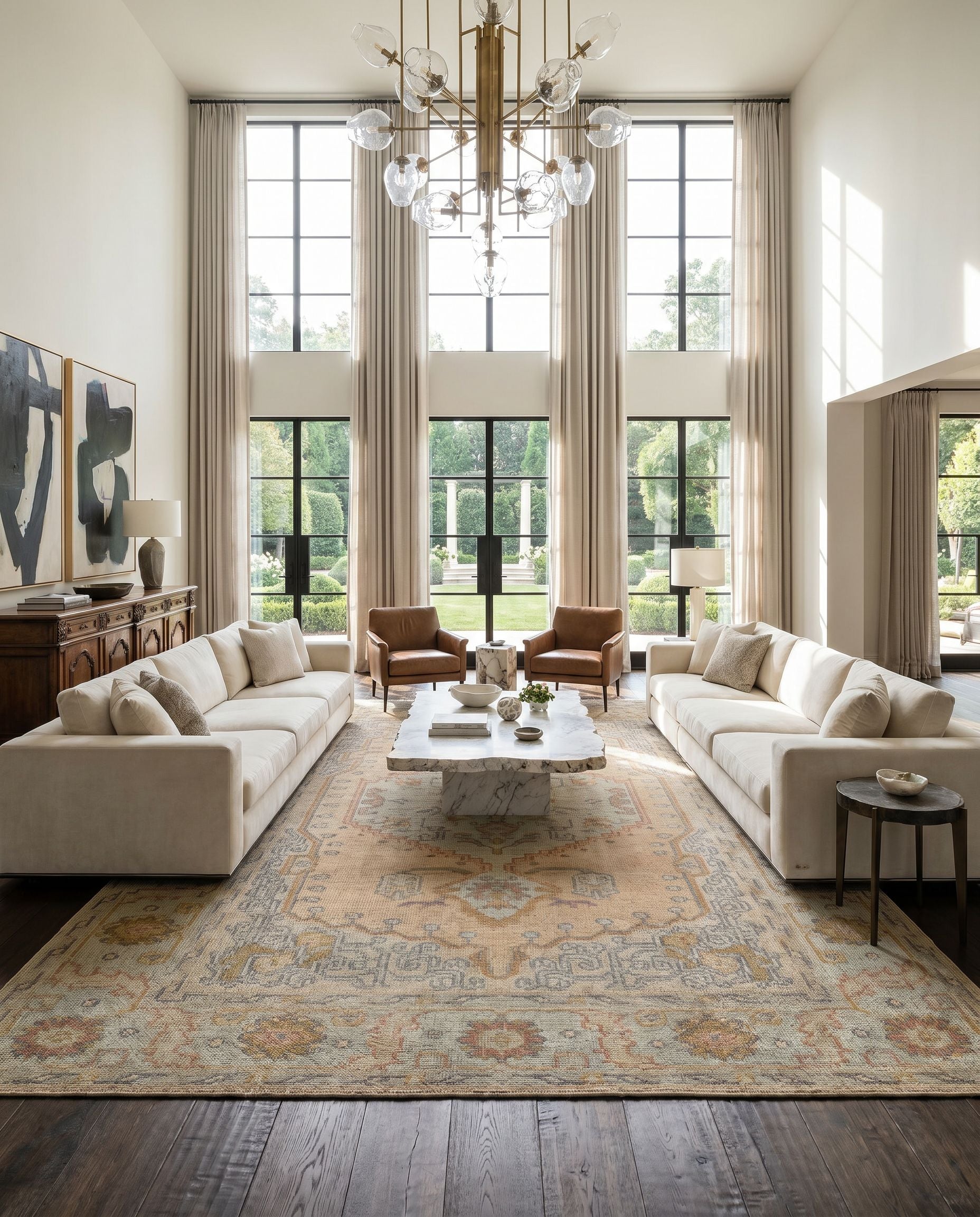 Nirvana NVN-2302 Hand Knotted Rug styled in an elegant designer living room — hand knotted traditional area rug in dusty coral, mustard, beige and medium gray tones