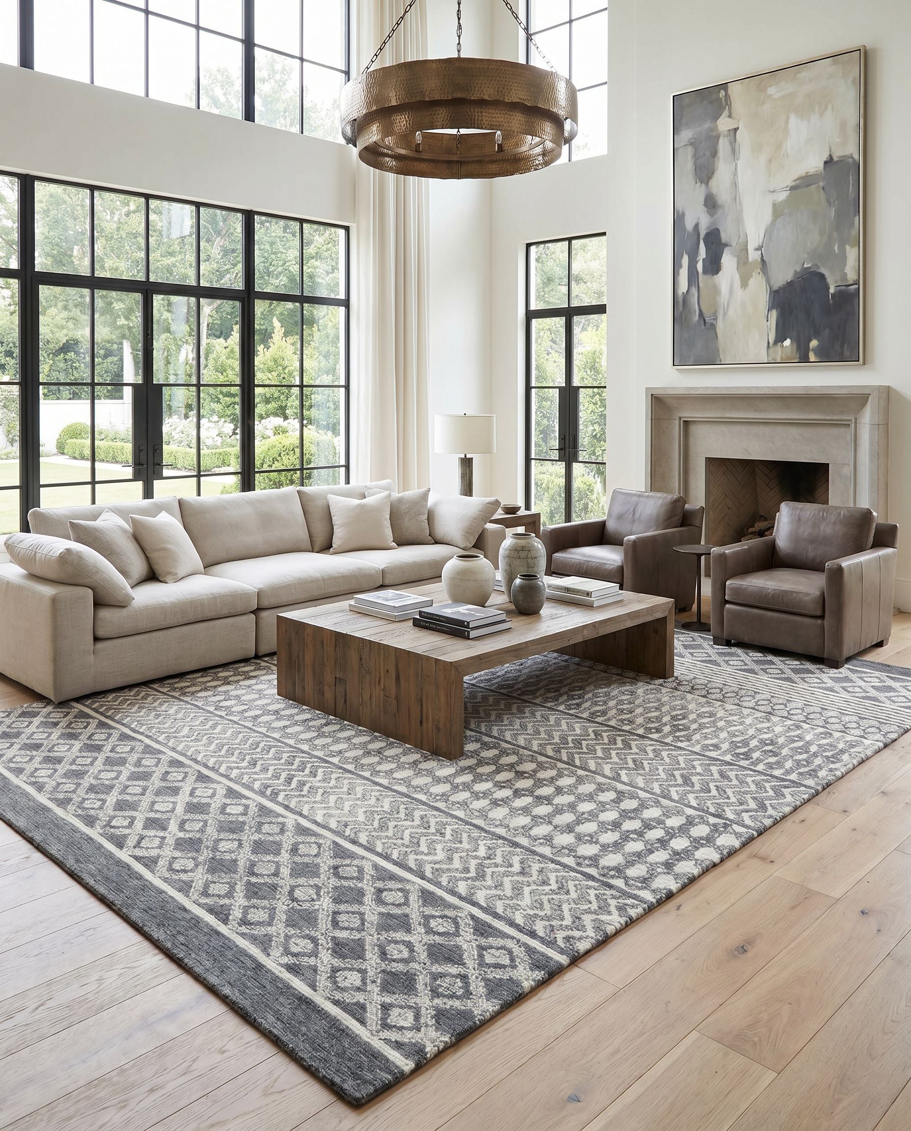 Maroc MAR-2305 Hand Tufted Rug styled in an elegant designer living room — hand tufted global area rug in light beige, oatmeal, charcoal and black tones
