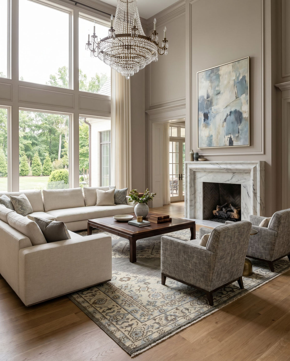 Palais PAL-2304 Hand Knotted Rug styled in an elegant designer living room — hand knotted traditional area rug in charcoal, denim, light beige and dark brown tones