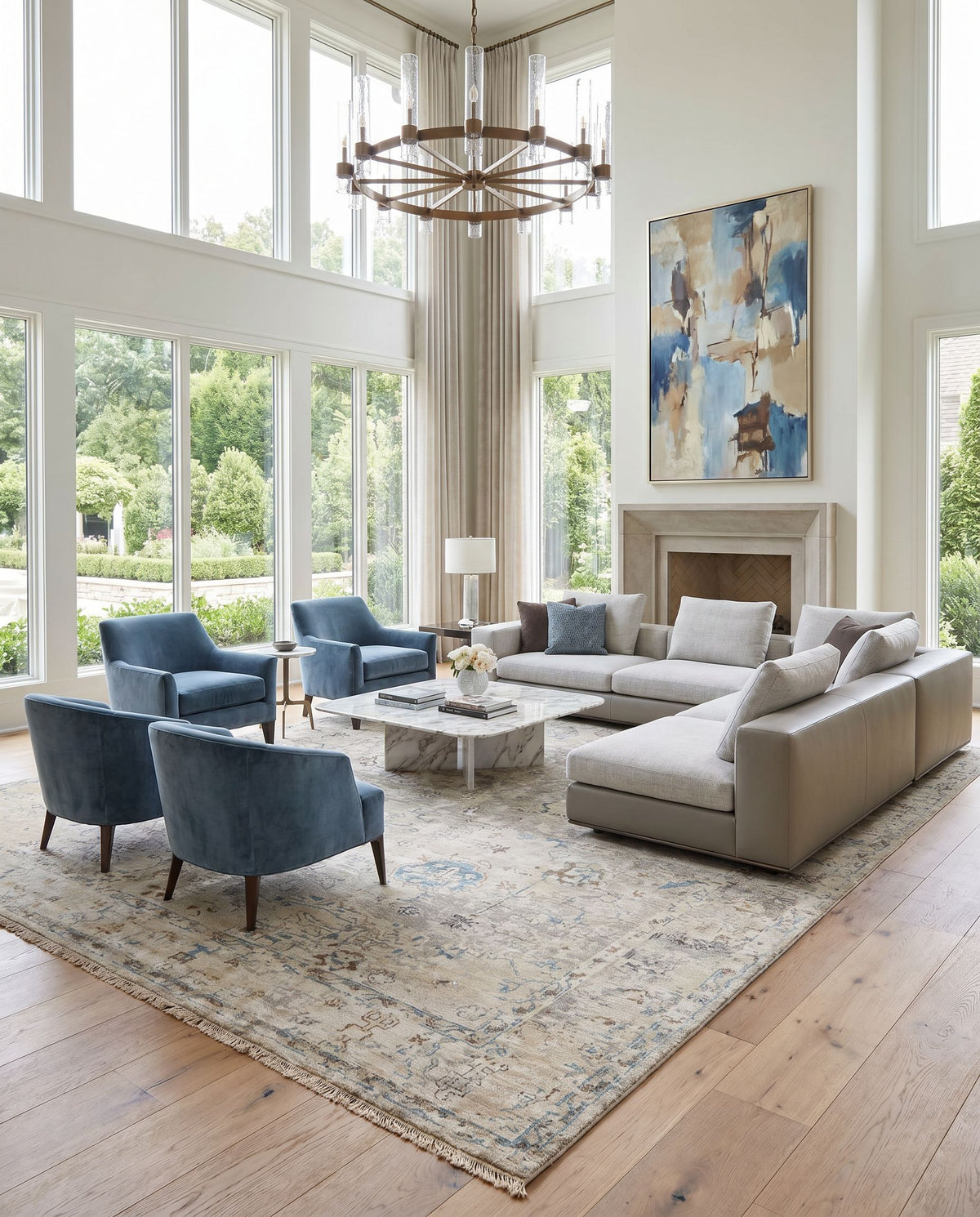 Theodora THO-3008 Hand Knotted Rug styled in an elegant designer living room — hand knotted traditional area rug in denim, sky blue, brown and charcoal tones