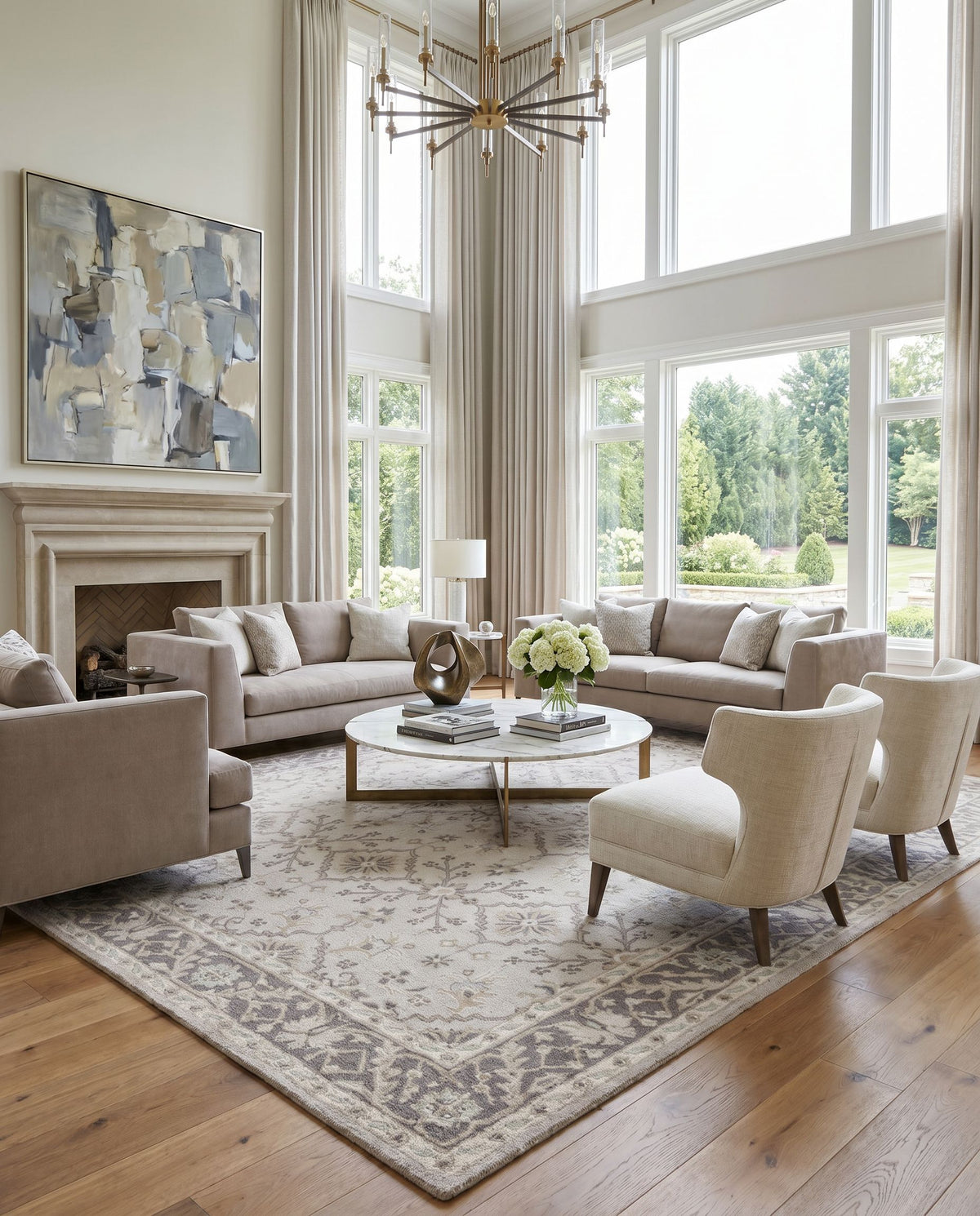 Castille CTL-2000 Hand Tufted Rug styled in an elegant designer living room — hand tufted traditional area rug in medium gray, charcoal, off-white and light brown tones