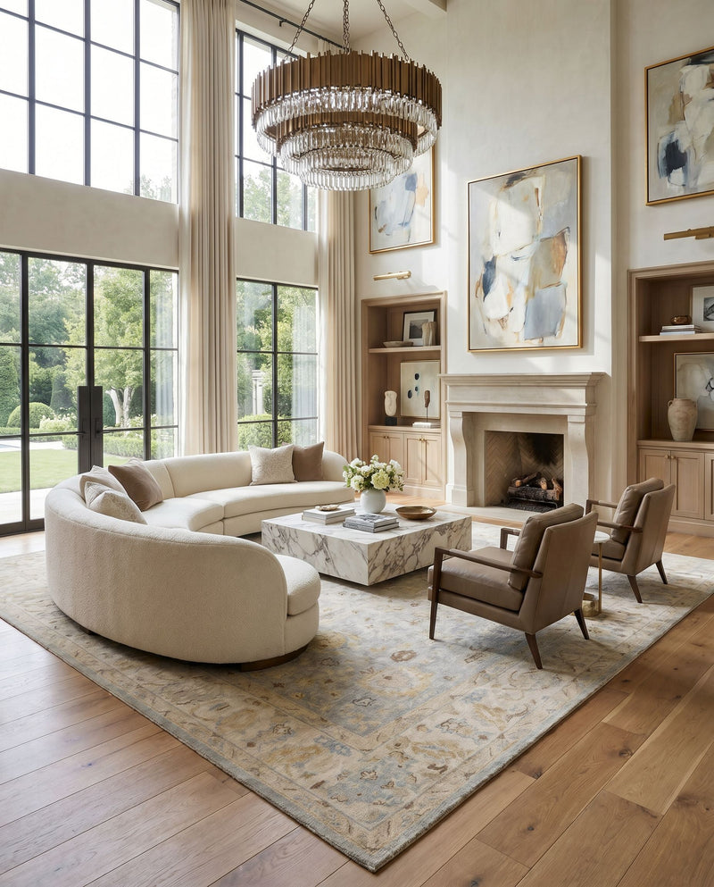 Normandy NOY-8011 Hand Knotted Rug styled in an elegant designer living room — hand knotted traditional area rug in oatmeal, taupe, pale blue and blue tones