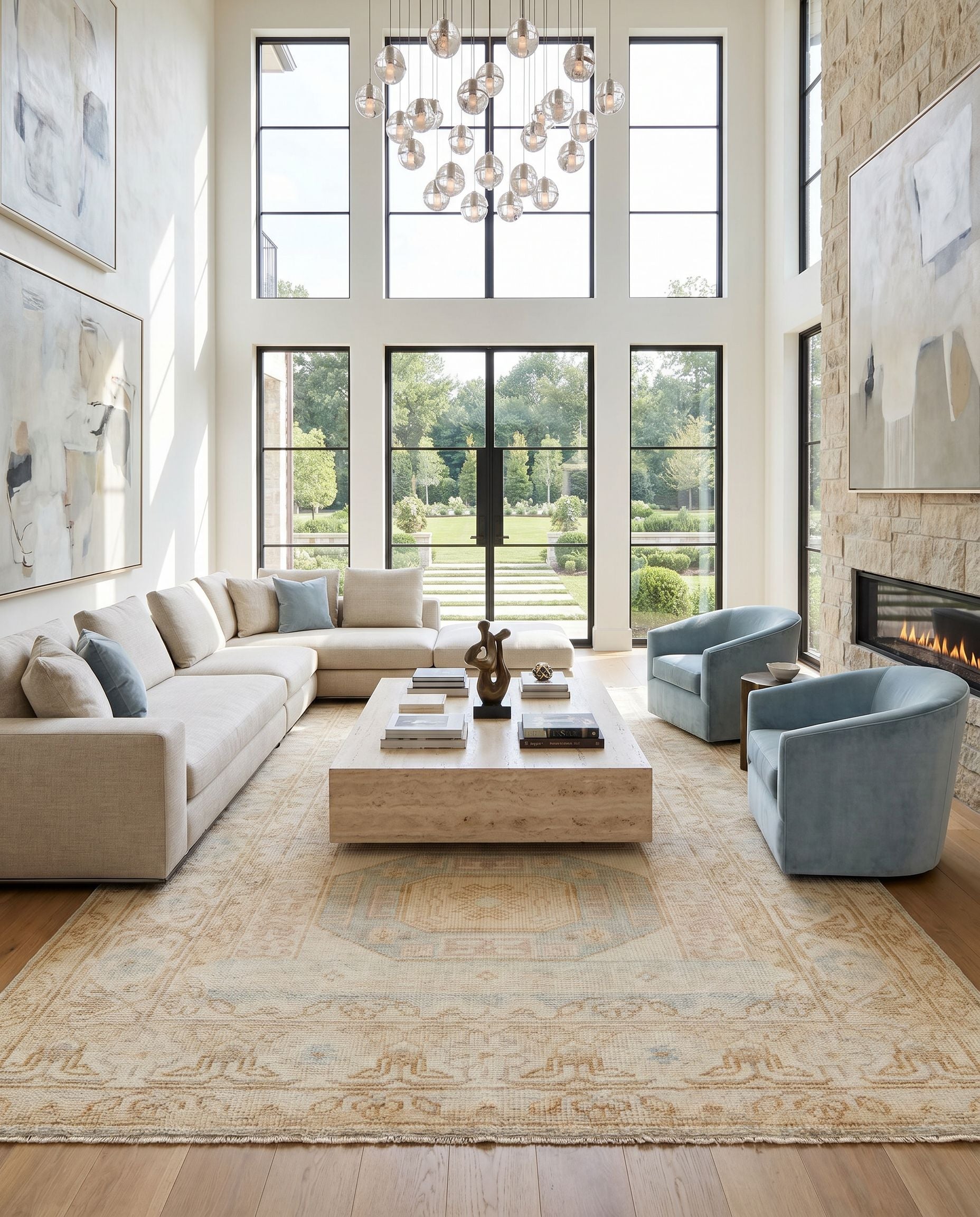 Anadolu AAU-2304 Hand Knotted Rug styled in an elegant designer living room — hand knotted traditional area rug in ice blue, dusty pink, light beige and mustard tones