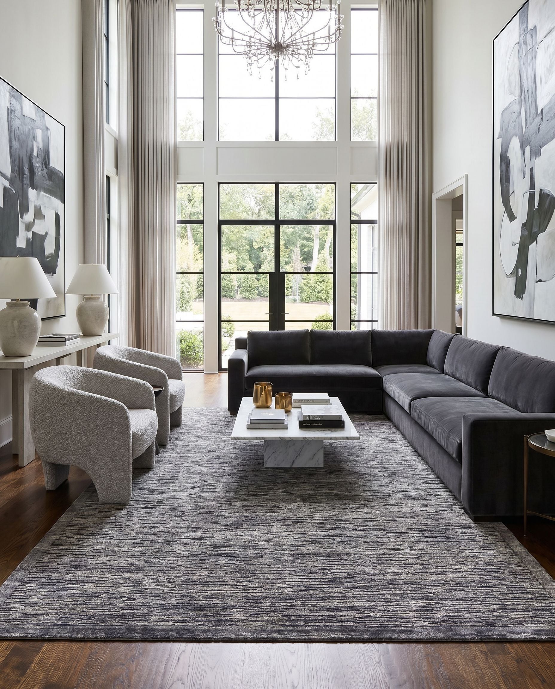 Capri CAP-2307 Hand Knotted Rug styled in an elegant designer living room — hand knotted modern area rug in black and charcoal tones