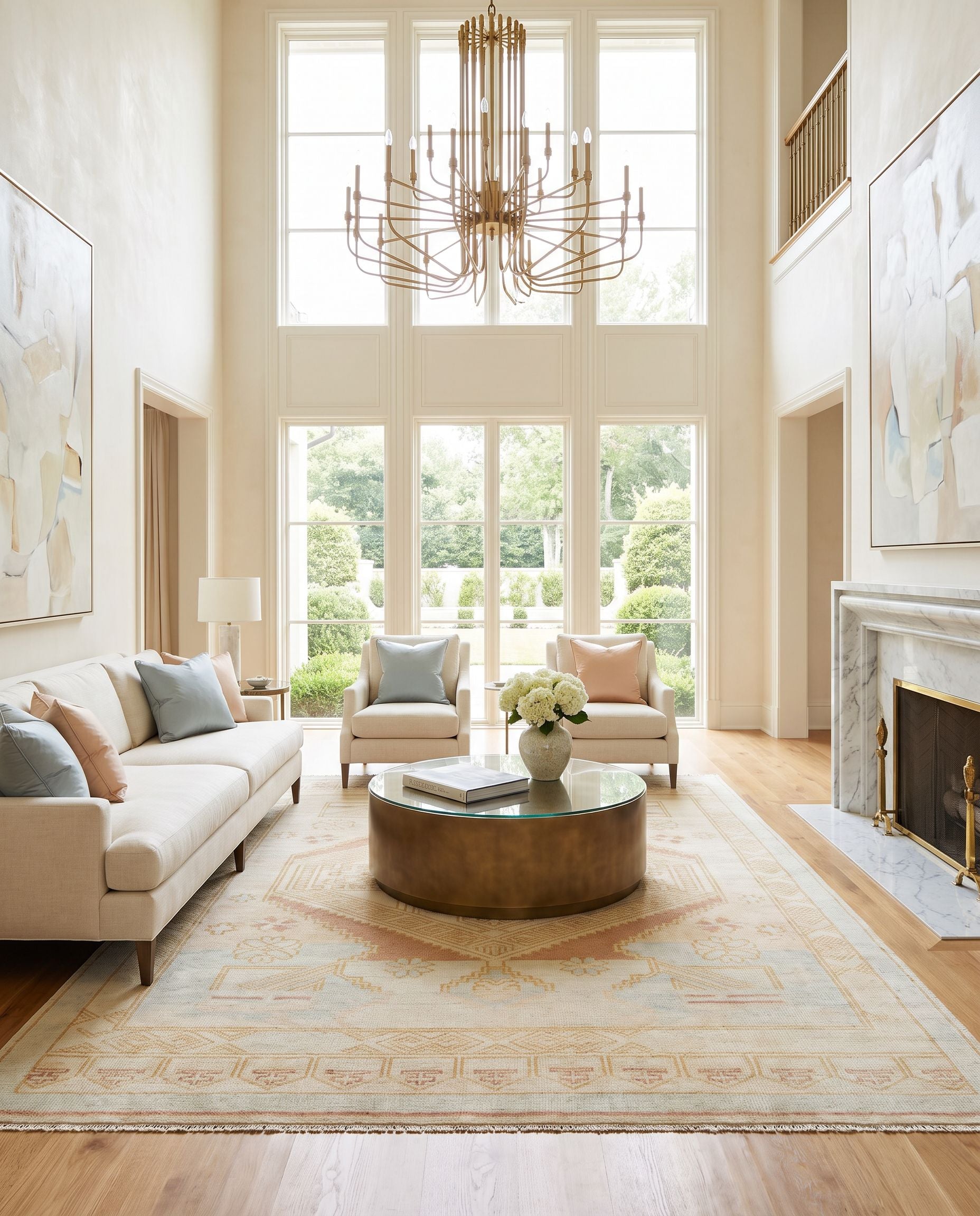 Anadolu AAU-2307 Hand Knotted Rug as the centerpiece of a bright luxury living room — a hand knotted traditional area rug in blue, camel, cream and pale pink tones