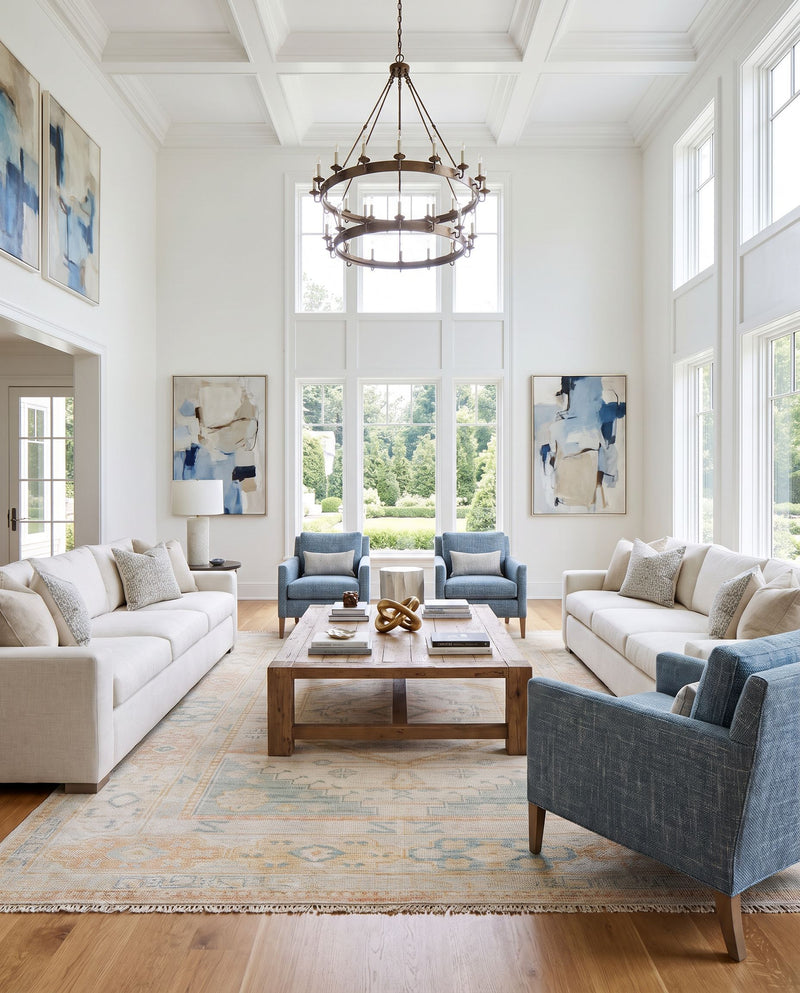 Anadolu AAU-2309 Hand Knotted Rug as the centerpiece of a bright luxury living room — a hand knotted traditional area rug in tan, dark pink, beige and sage tones