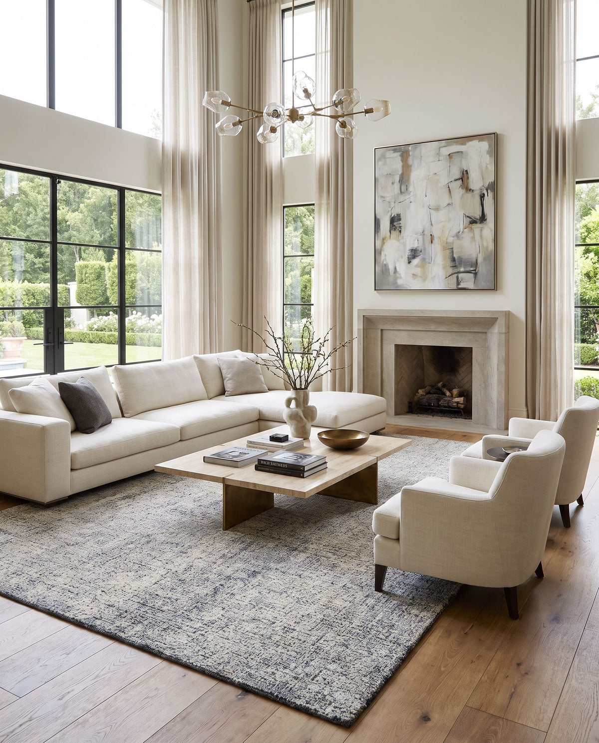 Alicia ACS-2302 Hand Tufted Rug as the centerpiece of a bright luxury living room — a hand tufted cottage area rug in taupe, light brown, black and dark blue tones