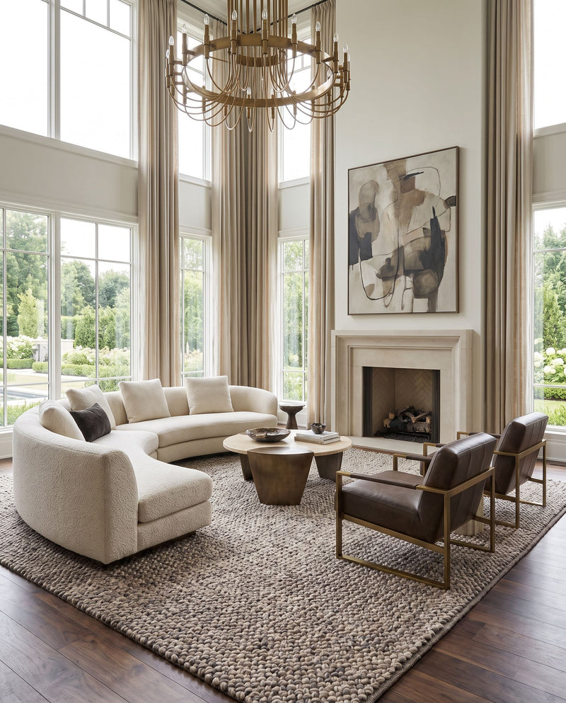 Avera AER-1003 Hand Woven Rug as the centerpiece of a bright luxury living room — a hand woven modern area rug in charcoal, ice blue, dark green and ivory tones