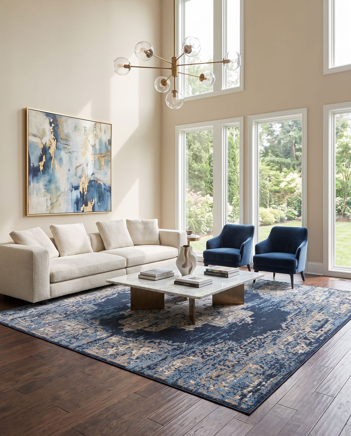 Amsterdam AMS-1025 Hand Woven Rug as the centerpiece of a bright luxury living room — a hand woven traditional area rug in taupe, beige, tan and blue tones